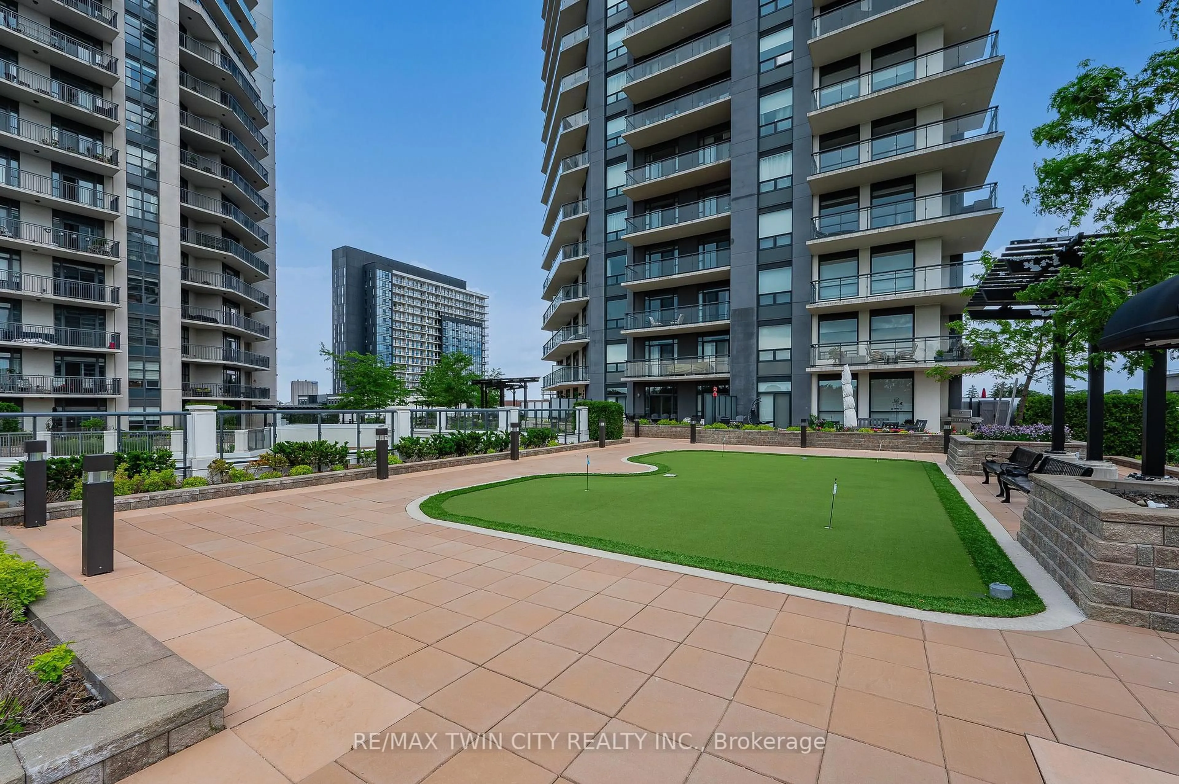 A pic from outside/outdoor area/front of a property/back of a property/a pic from drone, city buildings view from balcony for 155 Caroline St #1411, Waterloo Ontario N2L 0J8