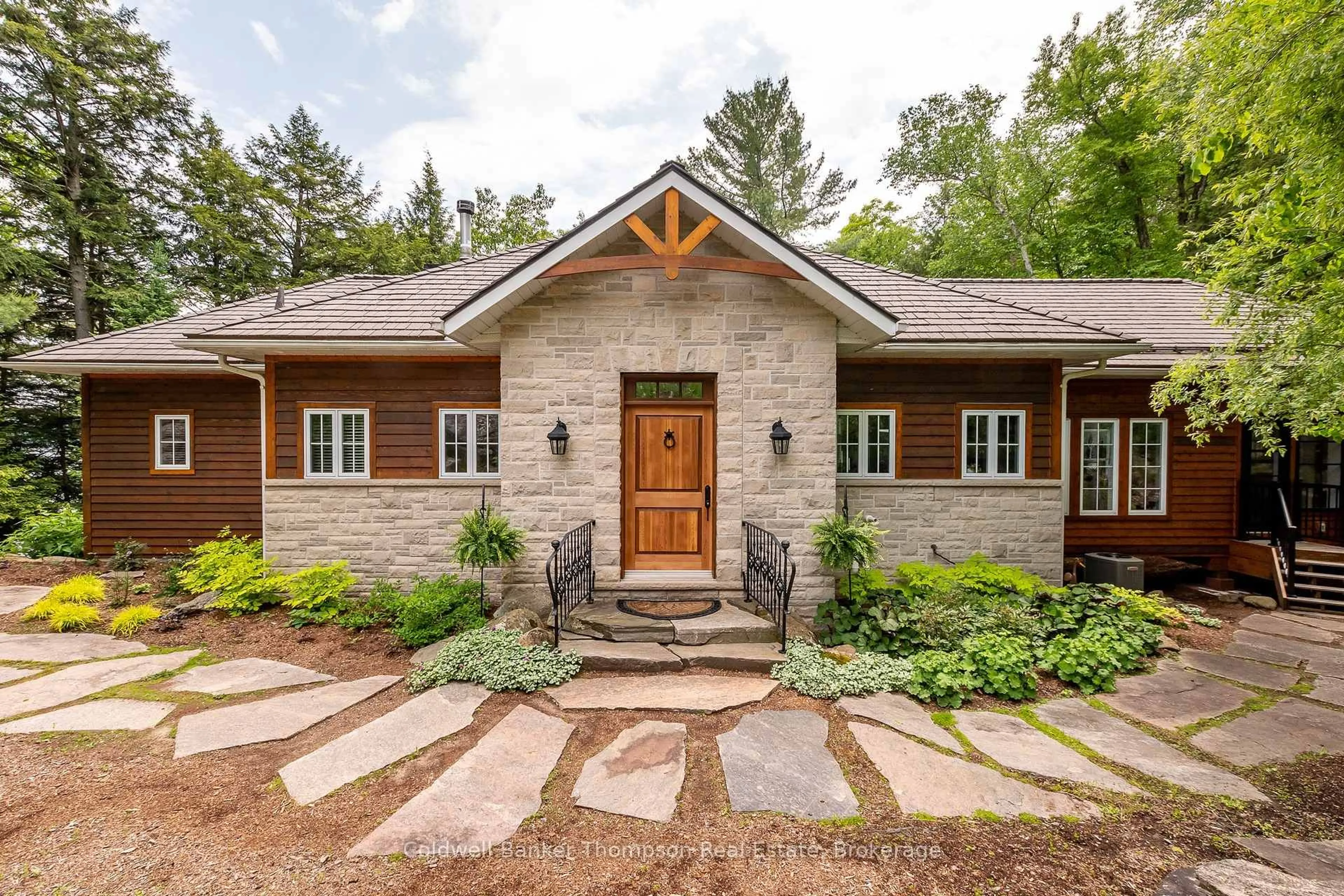 Home with brick exterior material, street for 707 Evergreen Tr, Huntsville Ontario P1H 2L5