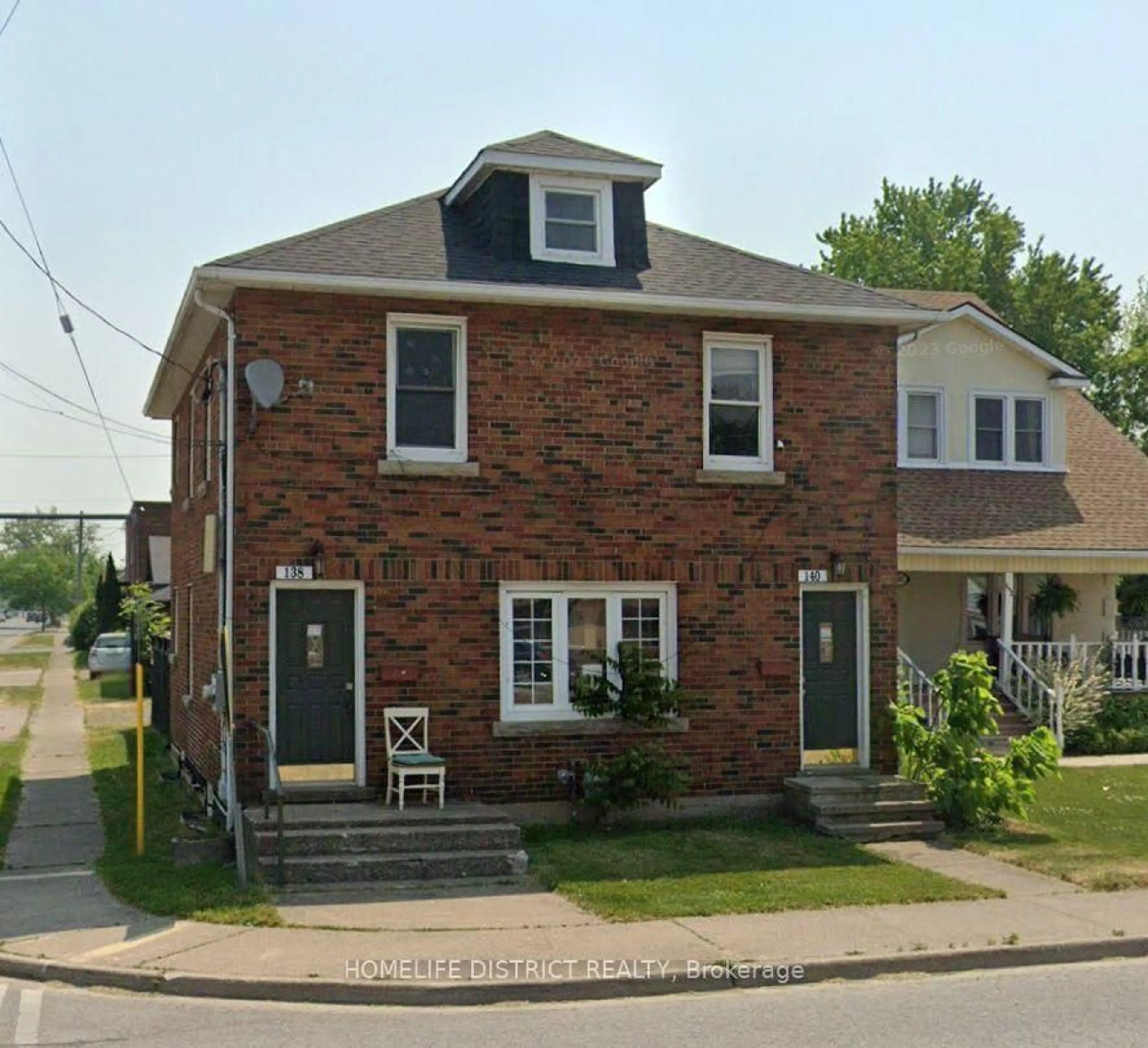 Home with brick exterior material, street for 138-140 Crowland Ave, Welland Ontario L3B 1X3