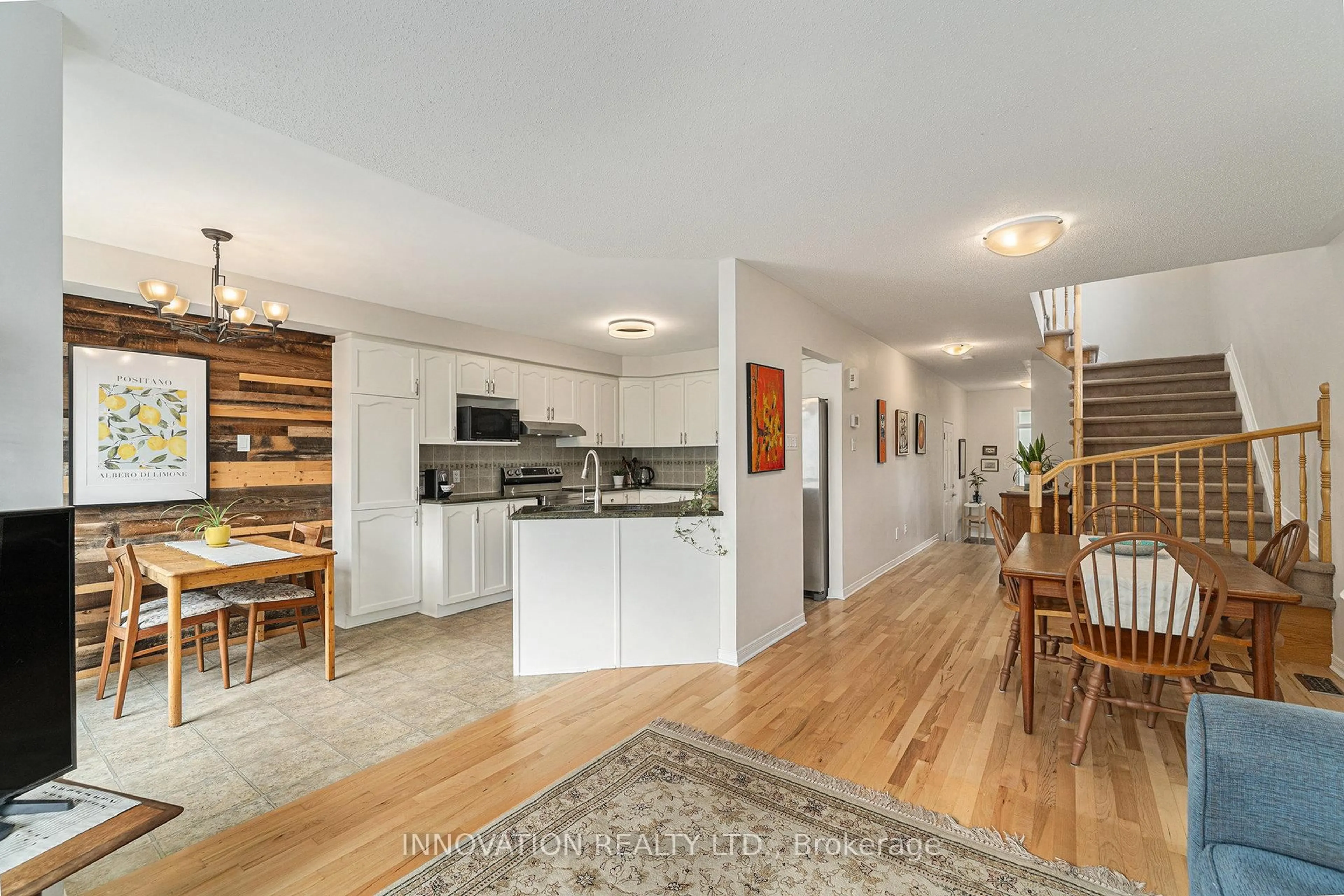 Open concept kitchen, wood/laminate floor for 441 Claridge Dr, Ottawa Ontario K2J 5J2