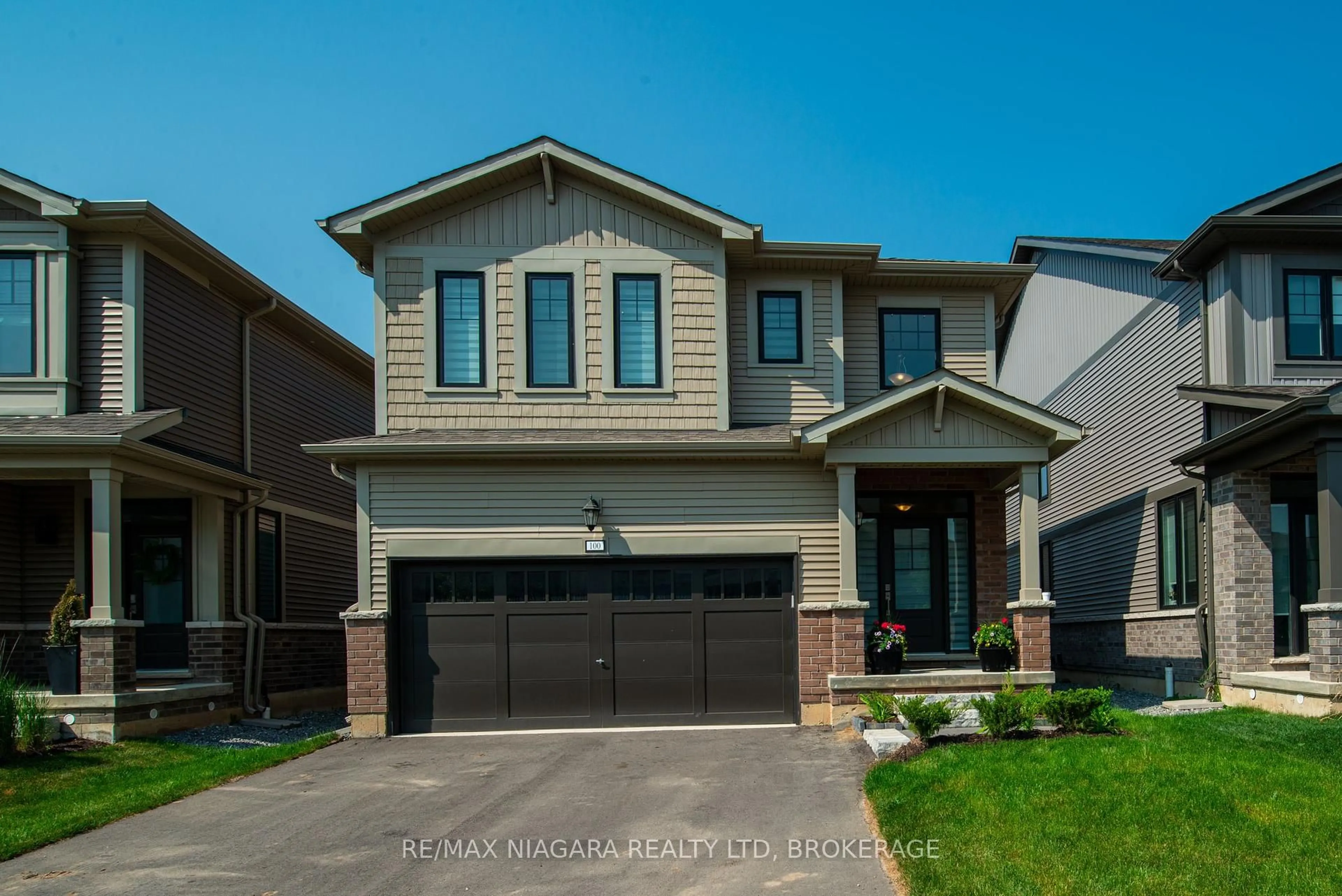 Home with brick exterior material, street for 100 Blackbird Way, Hamilton Ontario L0R 1W0