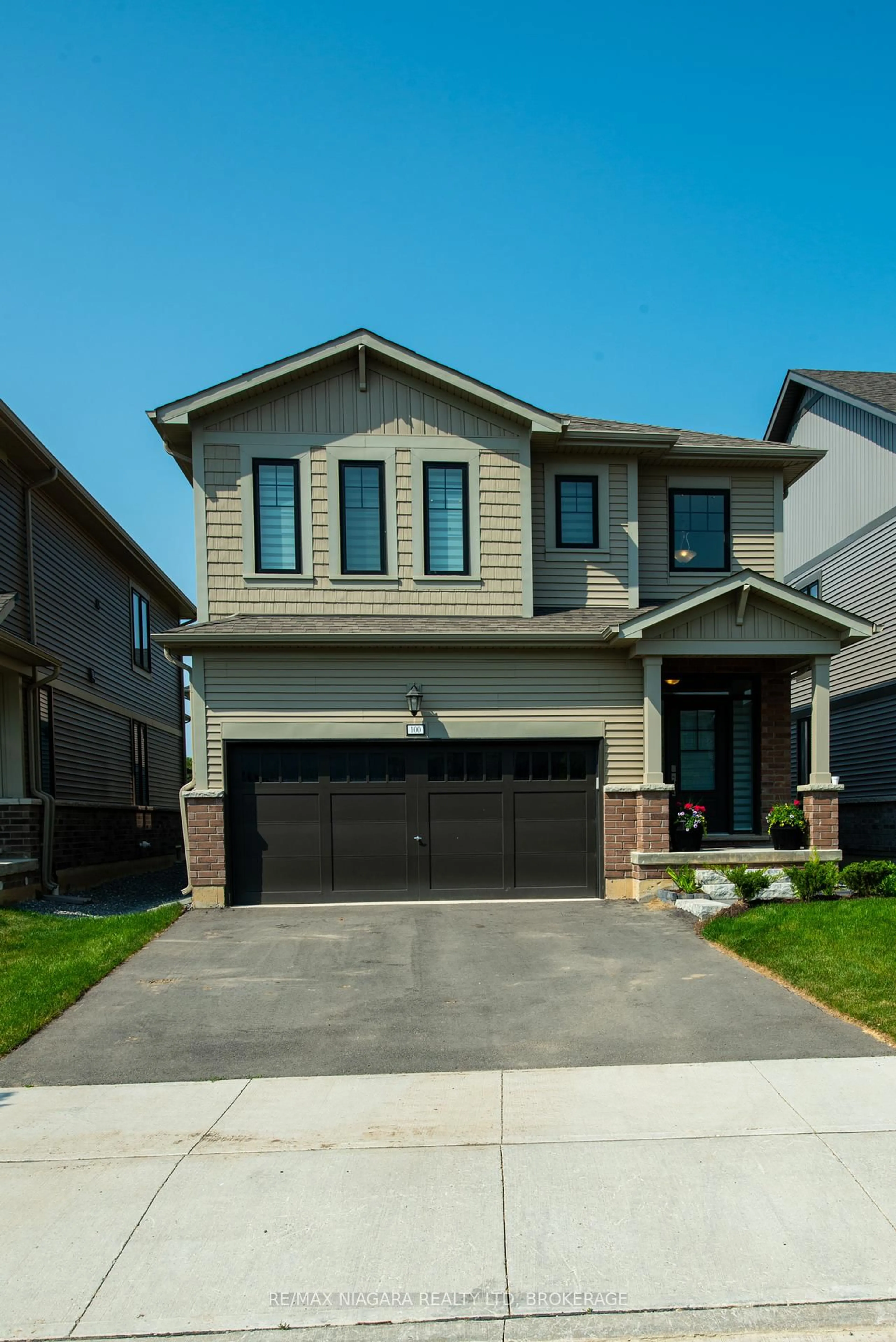 Home with brick exterior material, street for 100 Blackbird Way, Hamilton Ontario L0R 1W0