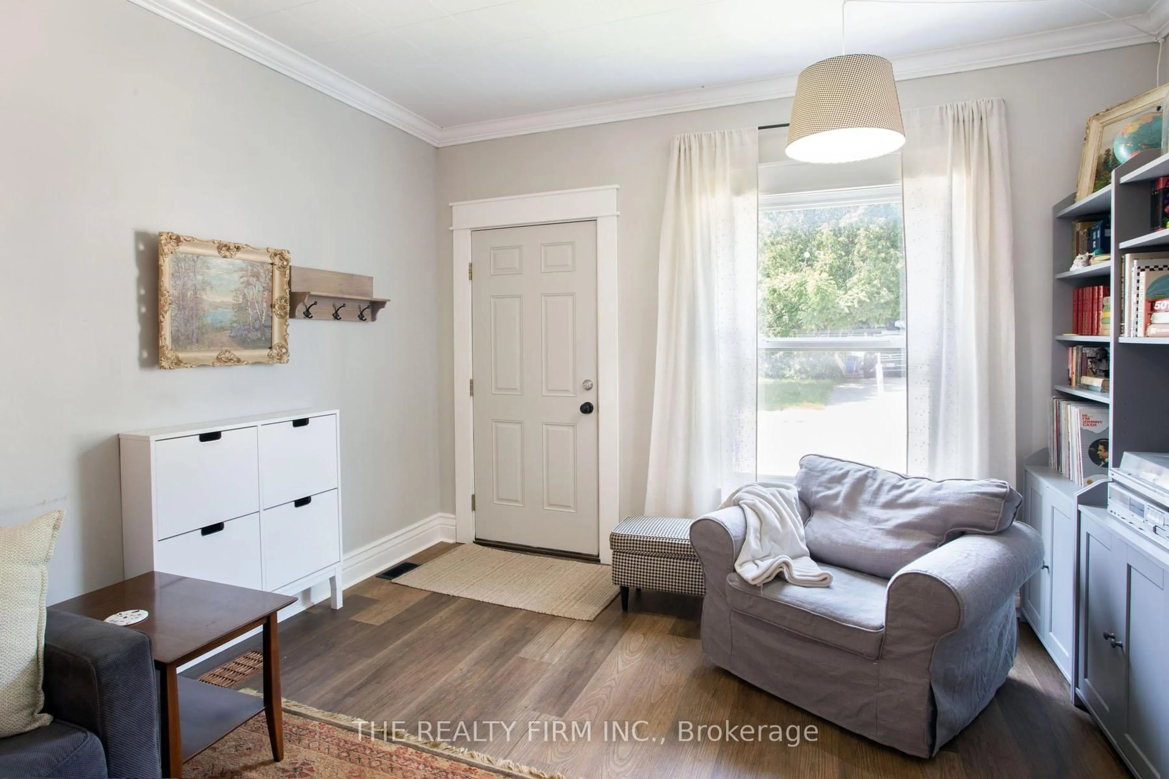 Living room with furniture, wood/laminate floor for 17 Weston St, London South Ontario N6C 1R2