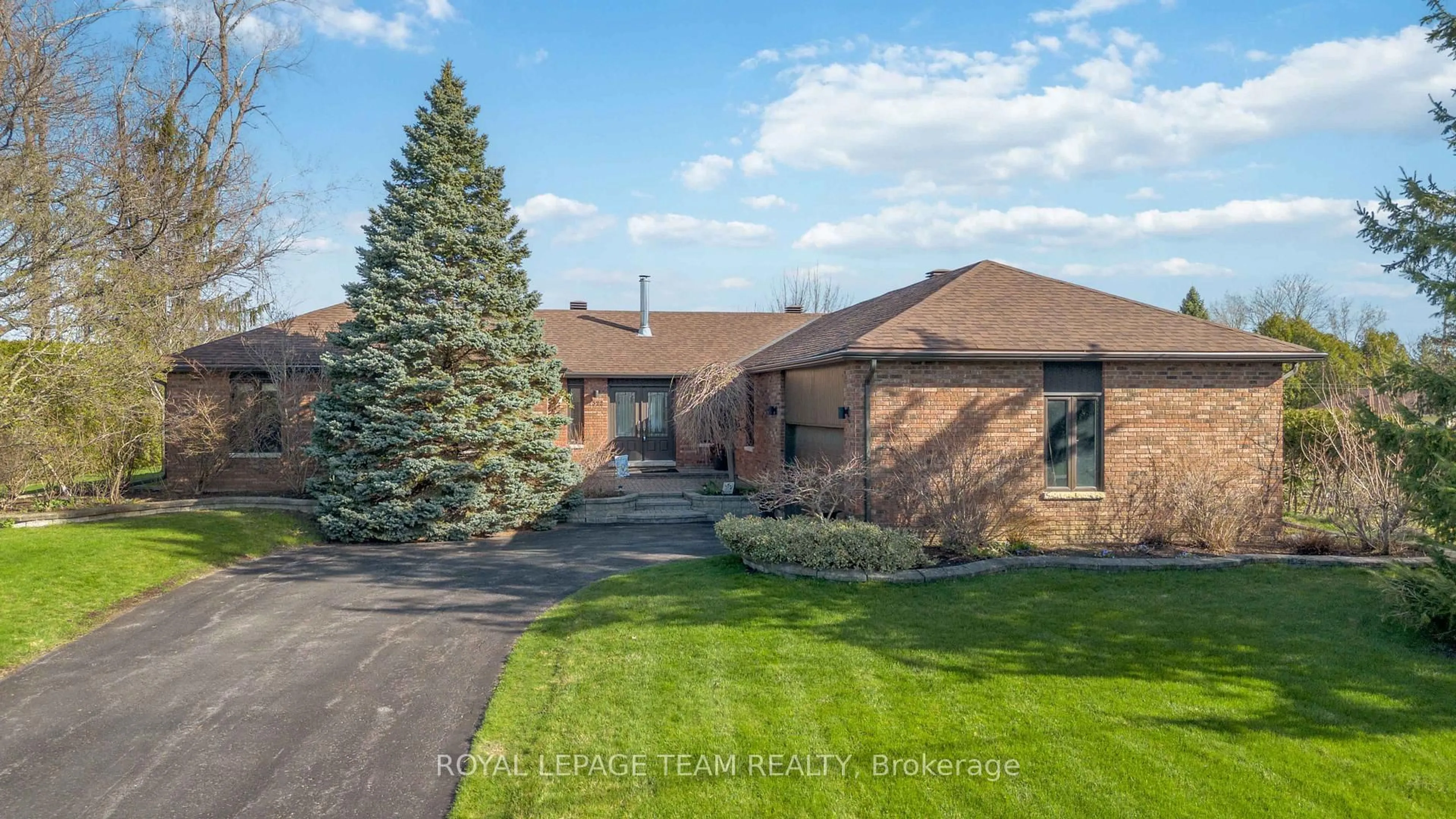 Home with brick exterior material, street for 1322 Johnston Dr, Greely Ontario K4P 1A4