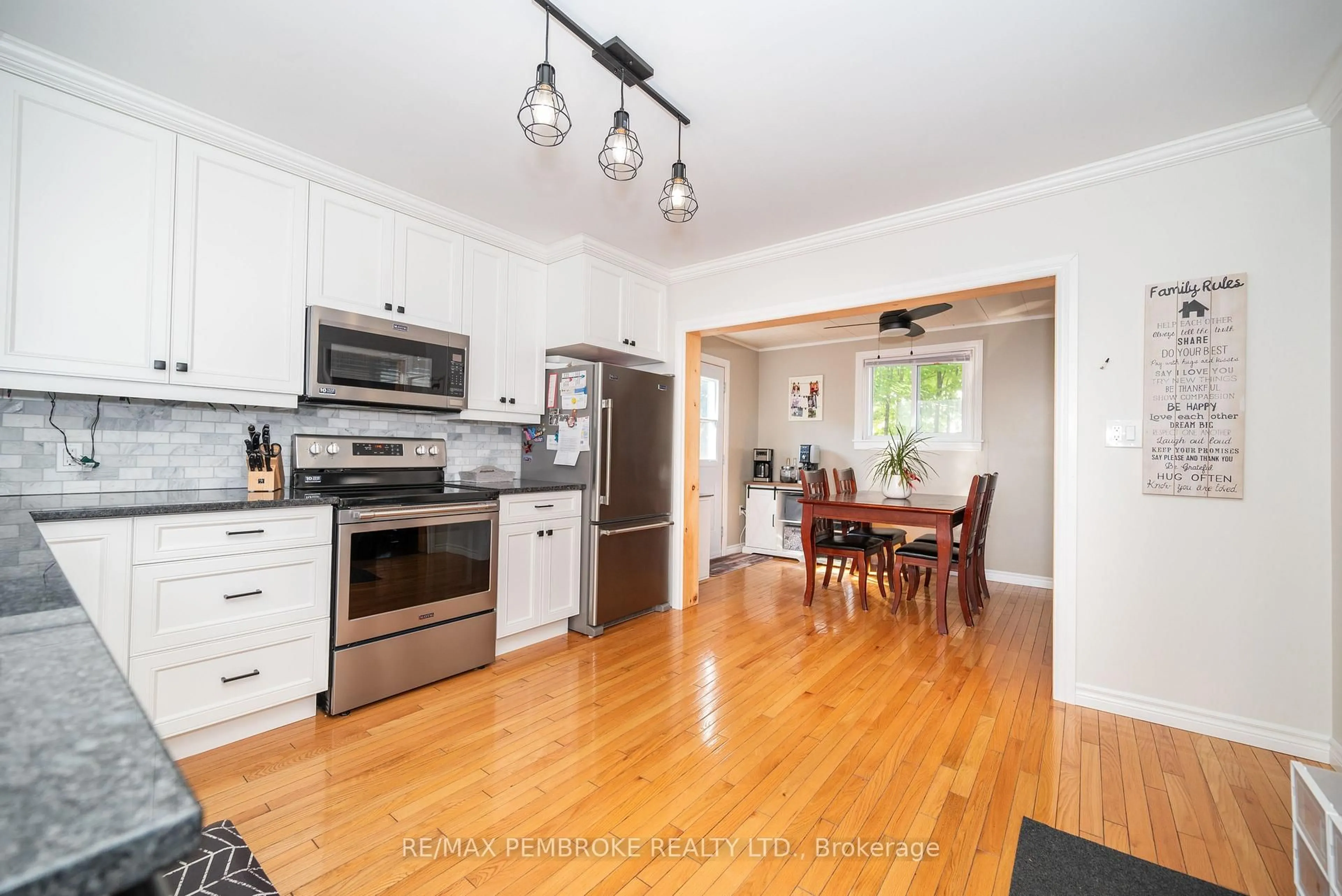 Open concept kitchen, wood/laminate floor for 594 Miller St, Pembroke Ontario K8A 6A2