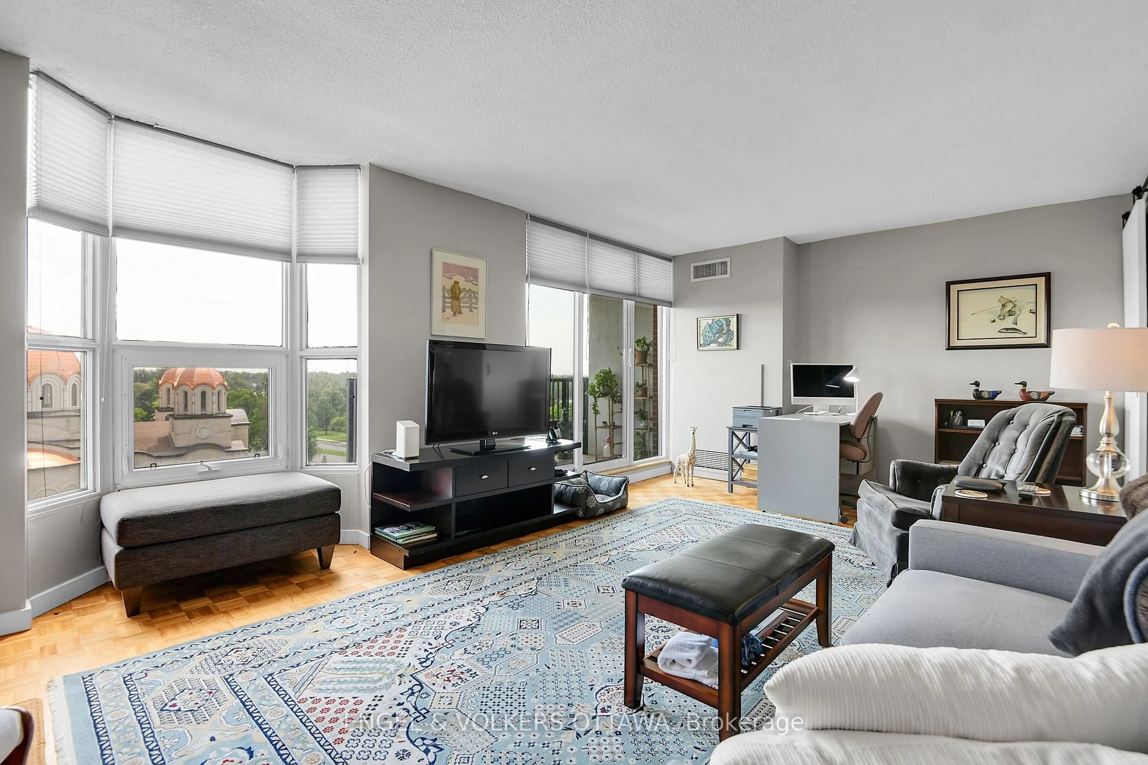 Living room with furniture, unknown for 2951 Riverside Dr #810, Ottawa Ontario K1V 8W6