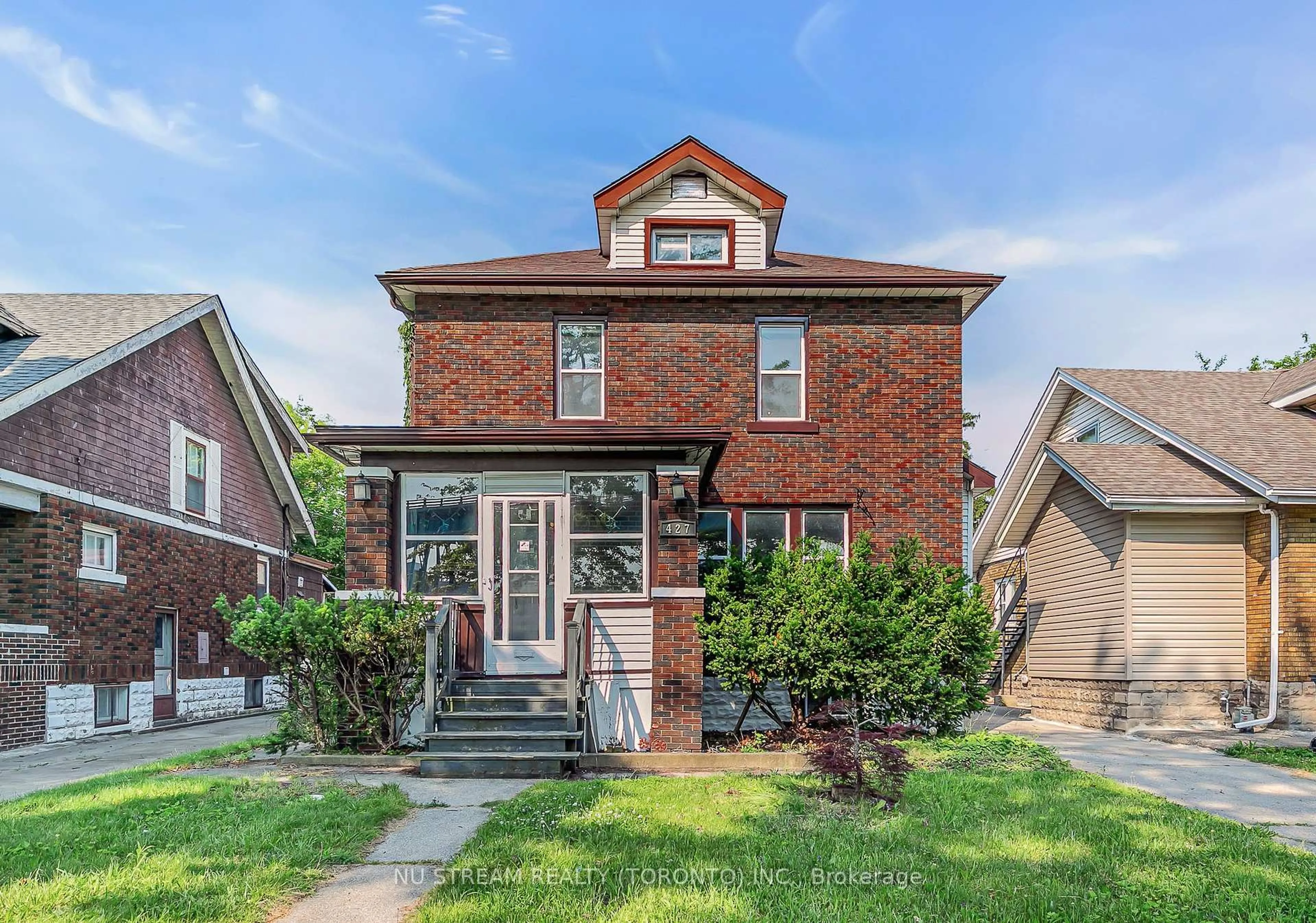 Home with brick exterior material, street for 427 Indian Rd, Windsor Ontario N9C 2M3