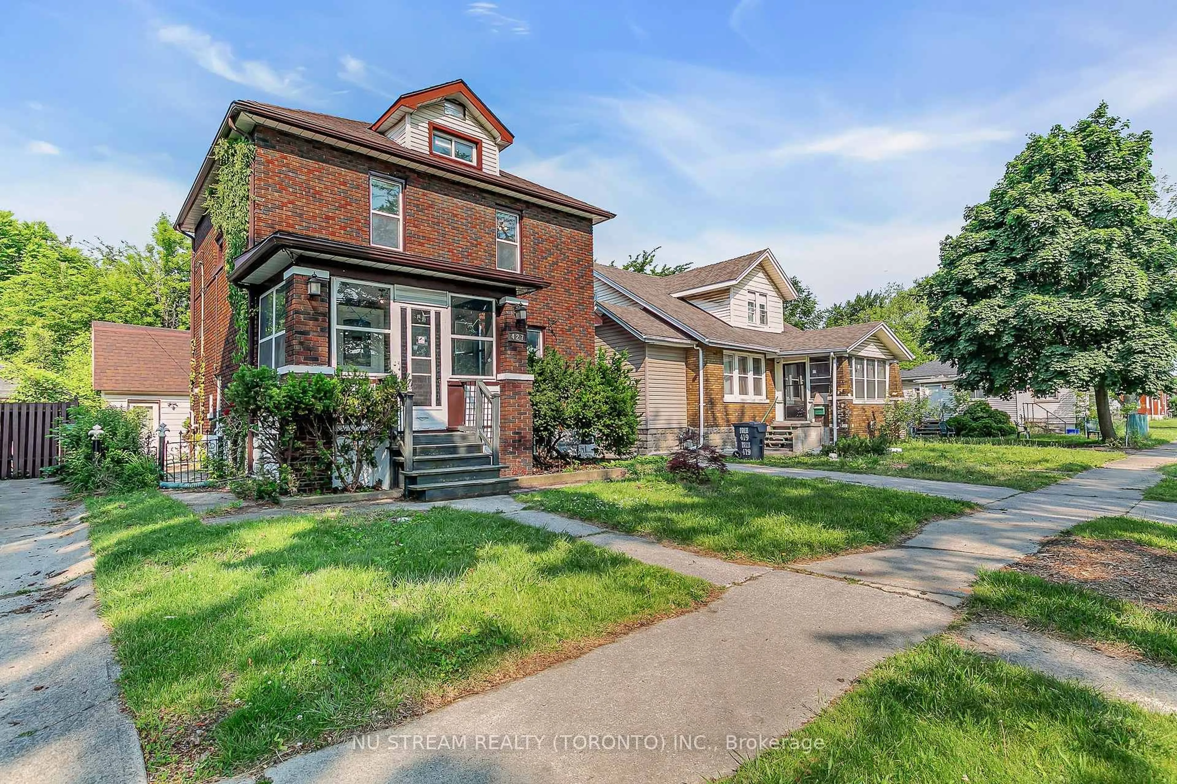 Home with brick exterior material, street for 427 Indian Rd, Windsor Ontario N9C 2M3