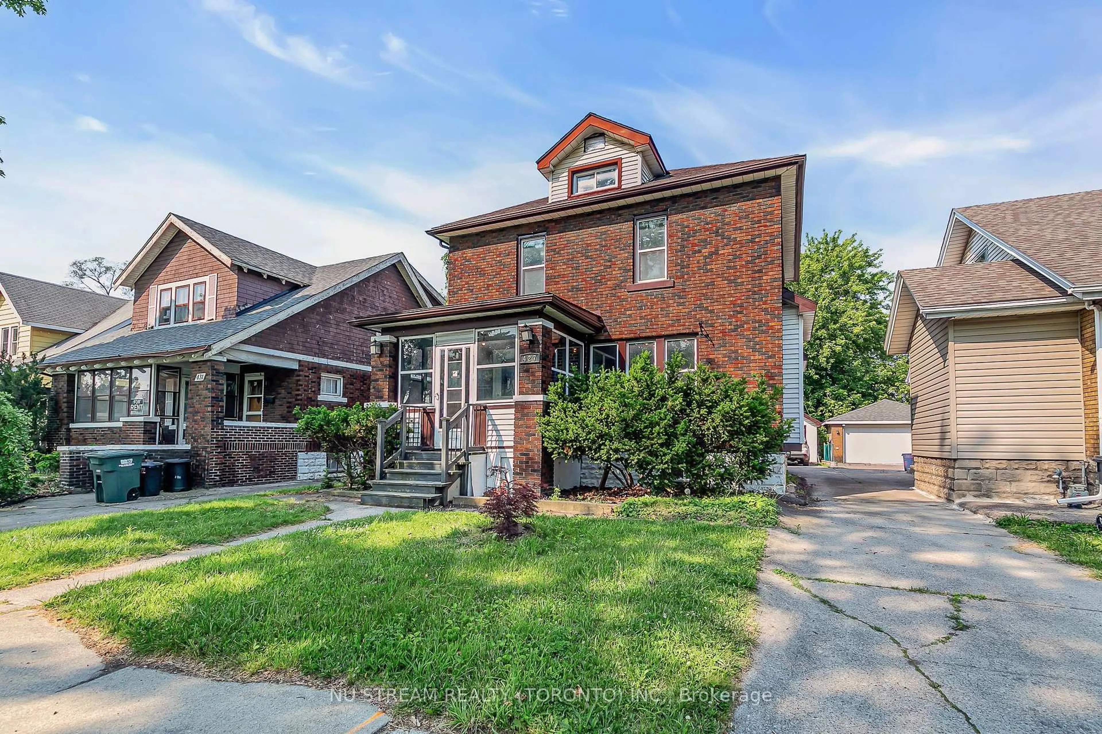 Home with brick exterior material, street for 427 Indian Rd, Windsor Ontario N9C 2M3