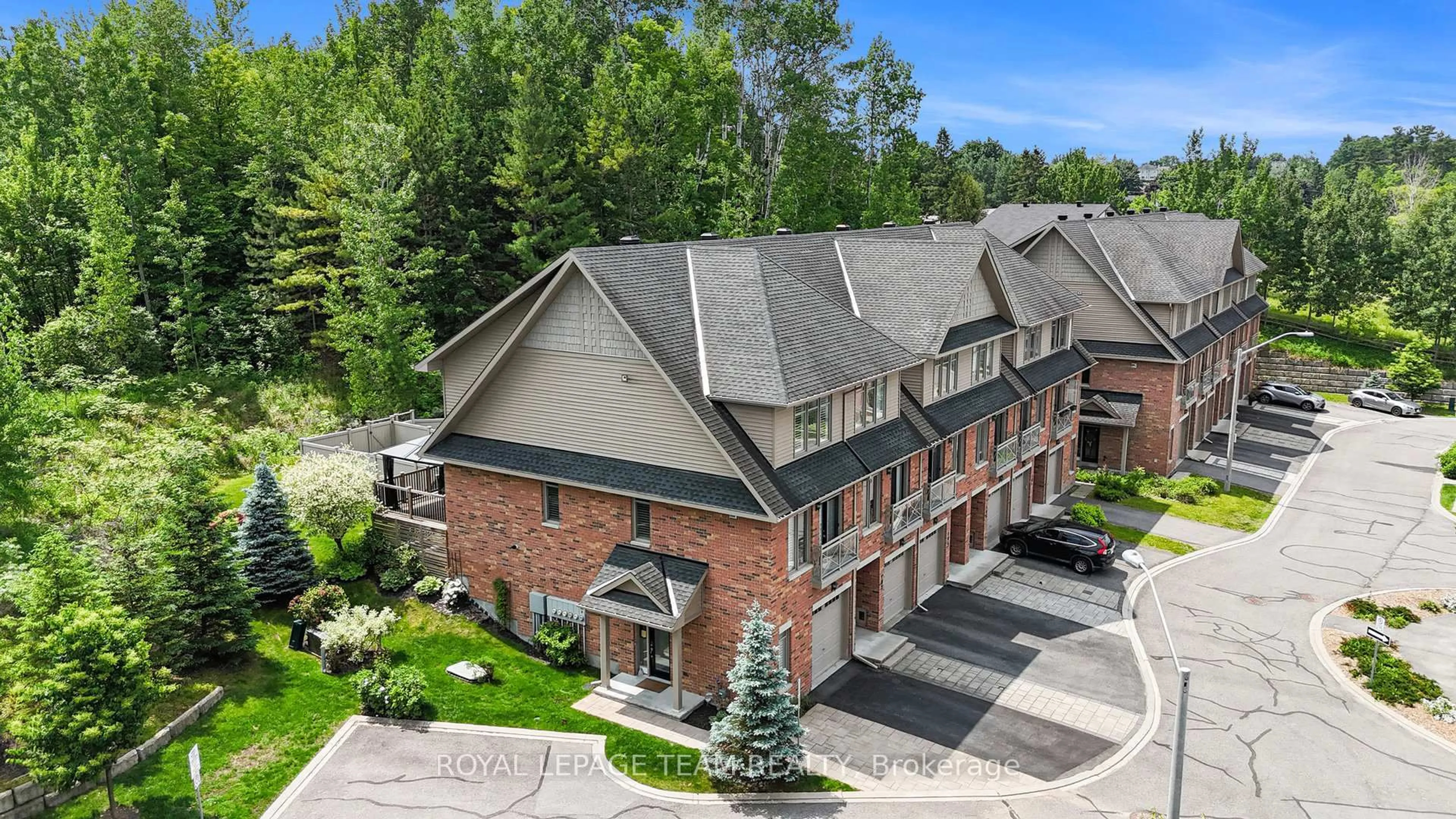 A pic from outside/outdoor area/front of a property/back of a property/a pic from drone, street for 100 Lionel Private, Ottawa Ontario K4A 0X1