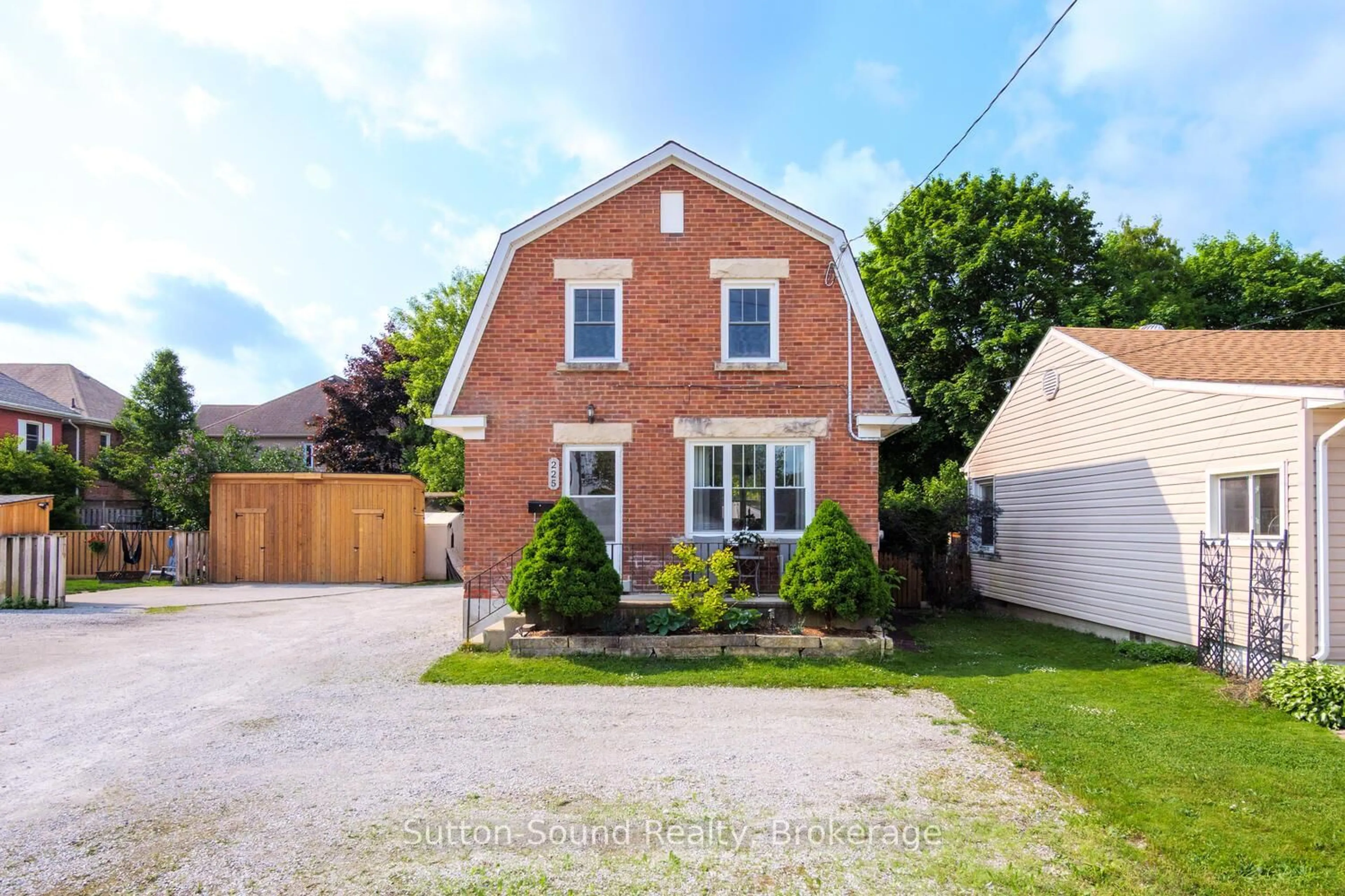 Home with brick exterior material, street for 225 12th St, Owen Sound Ontario N4K 3V3