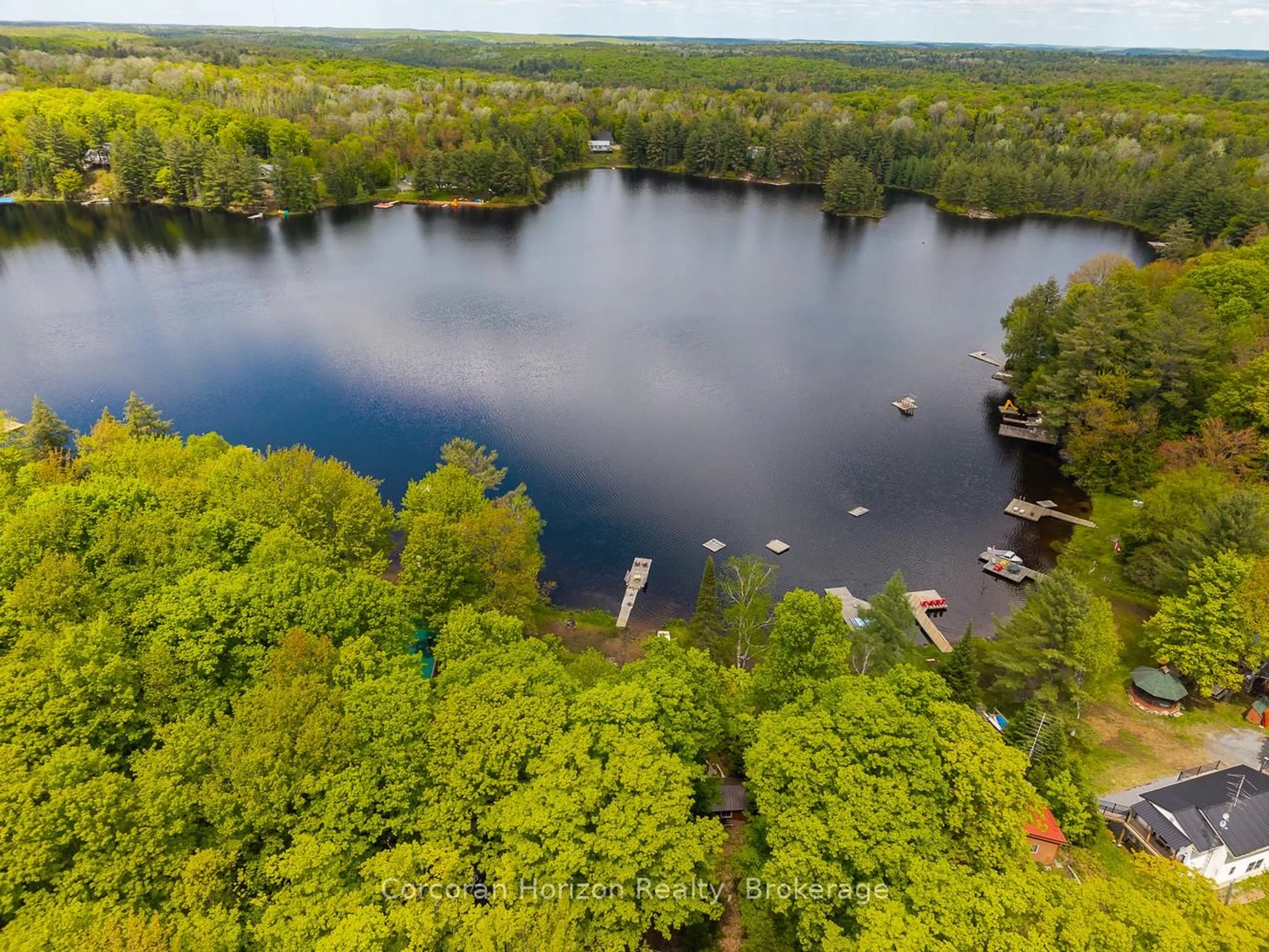 A pic from outside/outdoor area/front of a property/back of a property/a pic from drone, water/lake/river/ocean view for 247 Mainhood Rd, Huntsville Ontario P0B 1M0