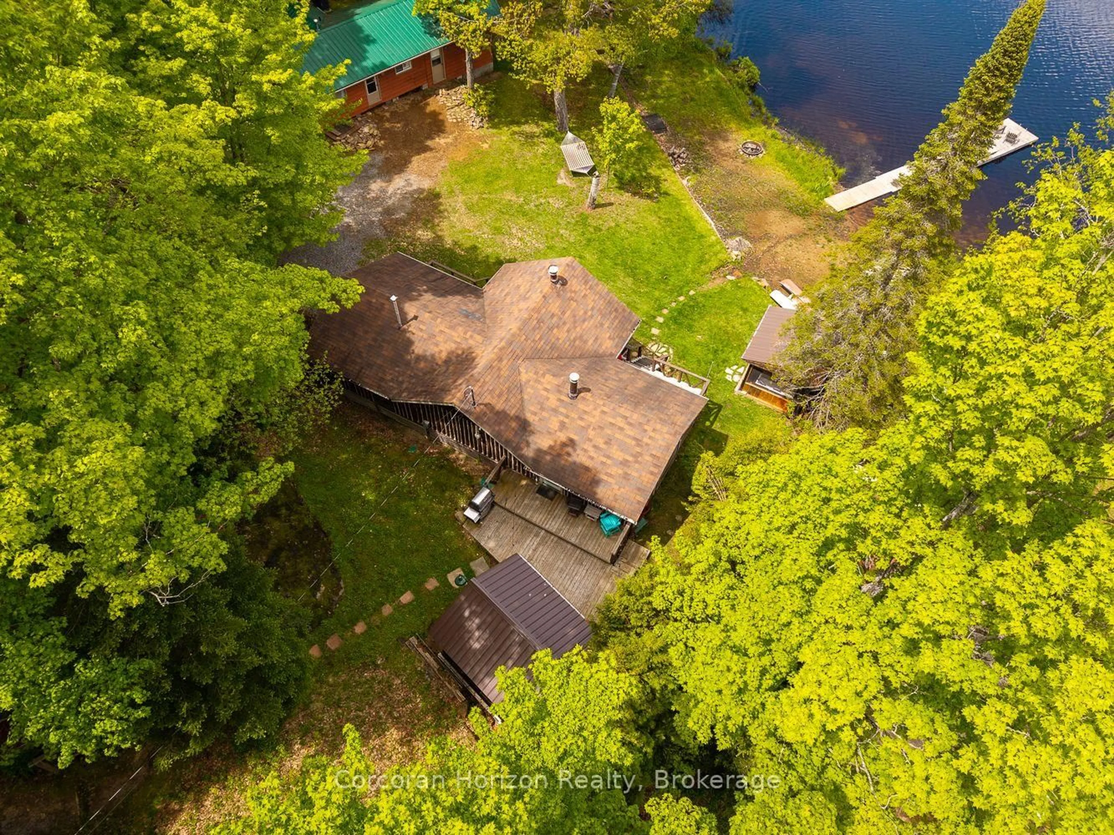 A pic from outside/outdoor area/front of a property/back of a property/a pic from drone, water/lake/river/ocean view for 247 Mainhood Rd, Huntsville Ontario P0B 1M0