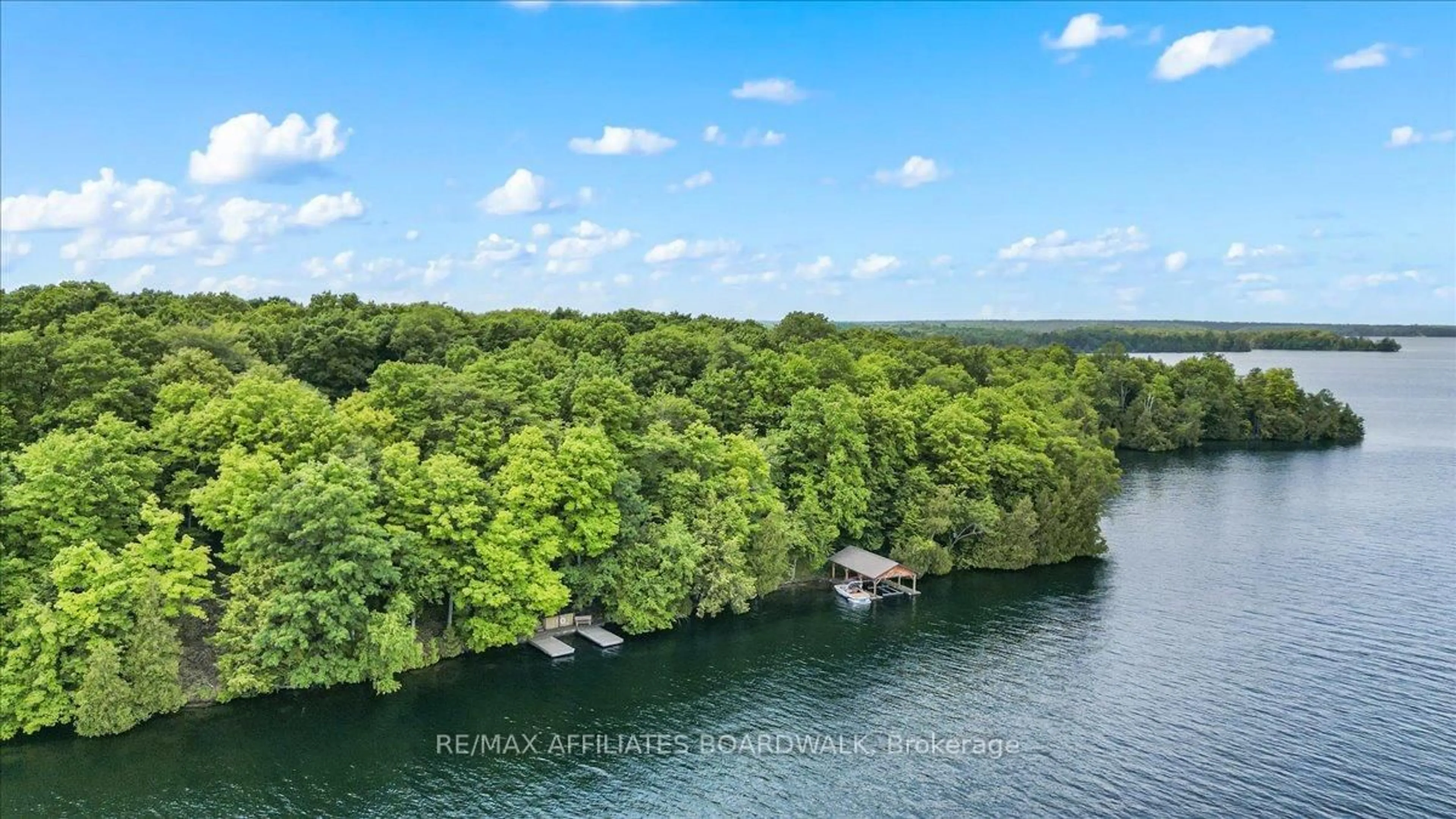 A pic from outside/outdoor area/front of a property/back of a property/a pic from drone, water/lake/river/ocean view for 6296 Big Rideau Rd, Rideau Lakes Ontario K0G 1V0
