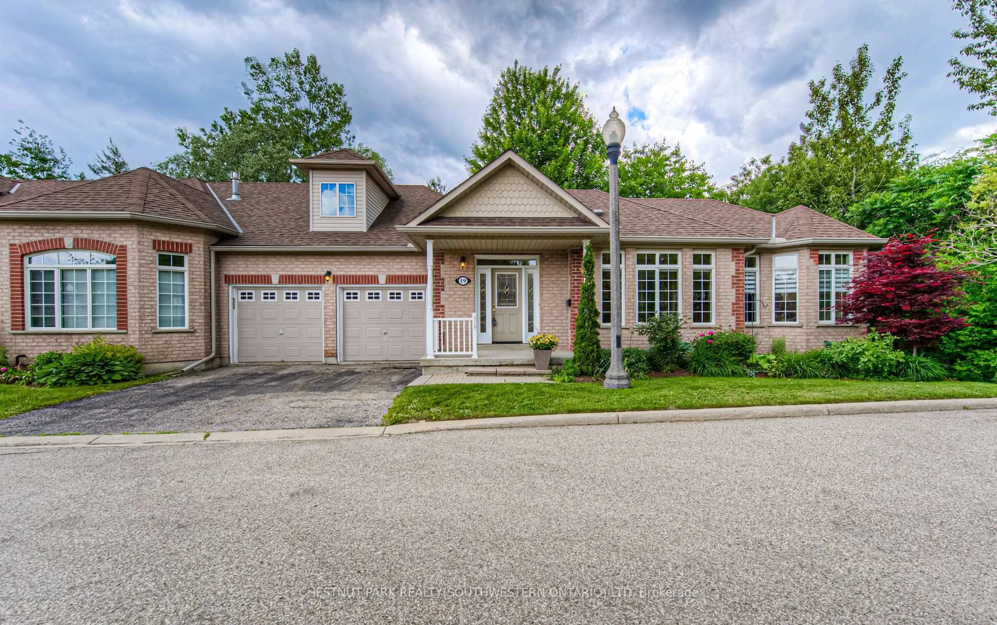 Home with brick exterior material, street for 100 Idle Creek Dr #19, Kitchener Ontario N2A 4H3