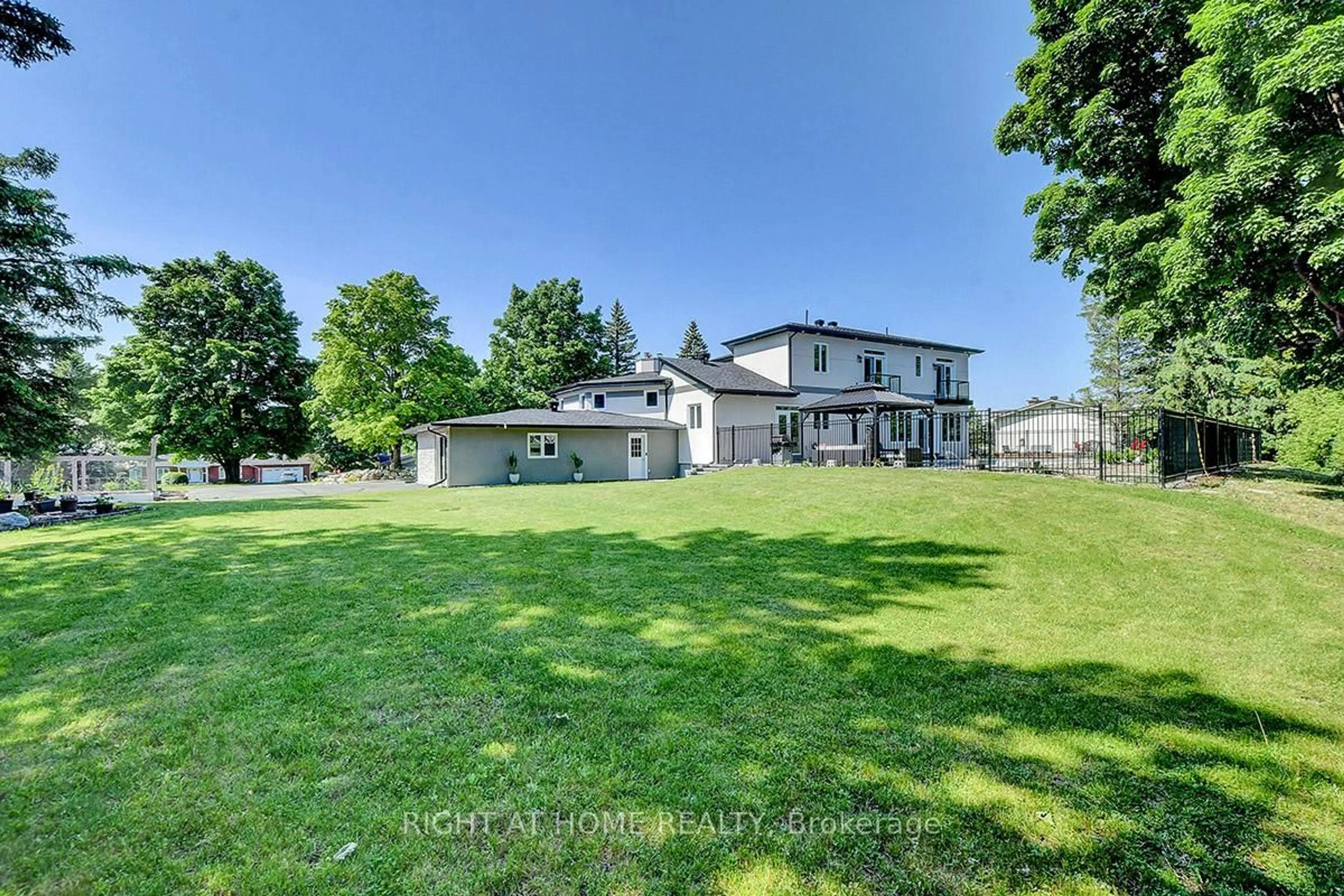 A pic from outside/outdoor area/front of a property/back of a property/a pic from drone, water/lake/river/ocean view for 25 Bren Maur Rd, Ottawa Ontario K2J 3Z7