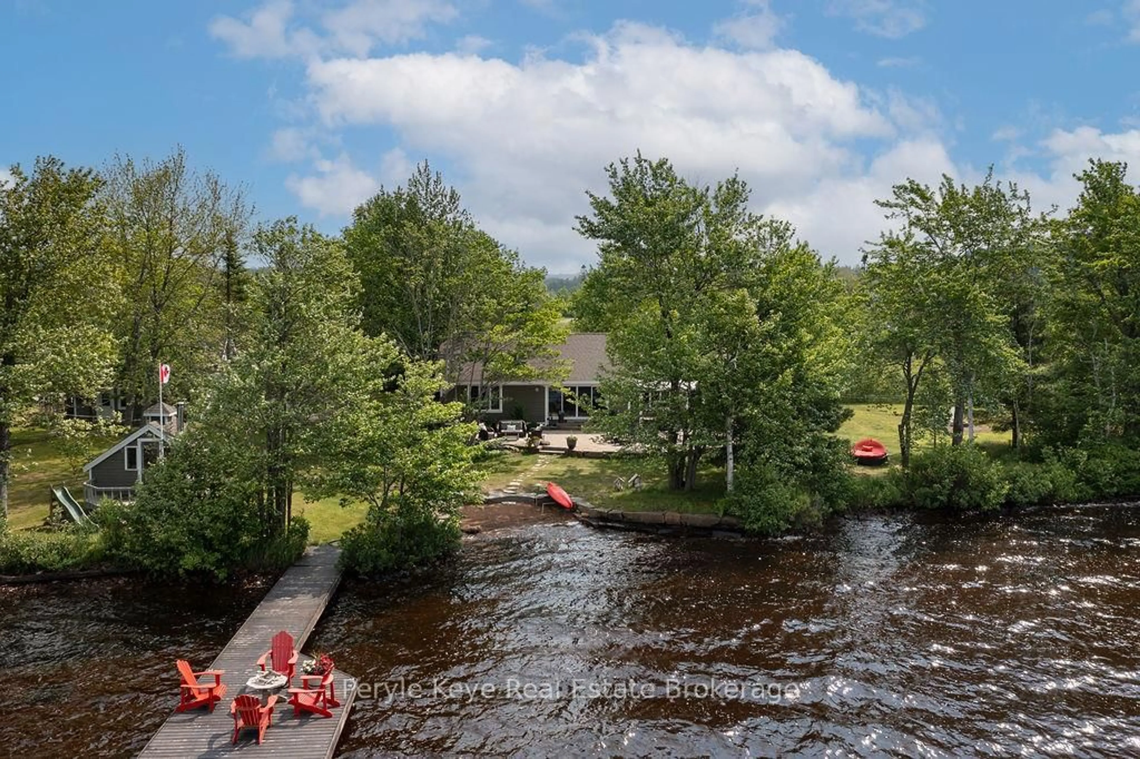 A pic from outside/outdoor area/front of a property/back of a property/a pic from drone, water/lake/river/ocean view for 118 Robin Rd, Huntsville Ontario P1H 1N4
