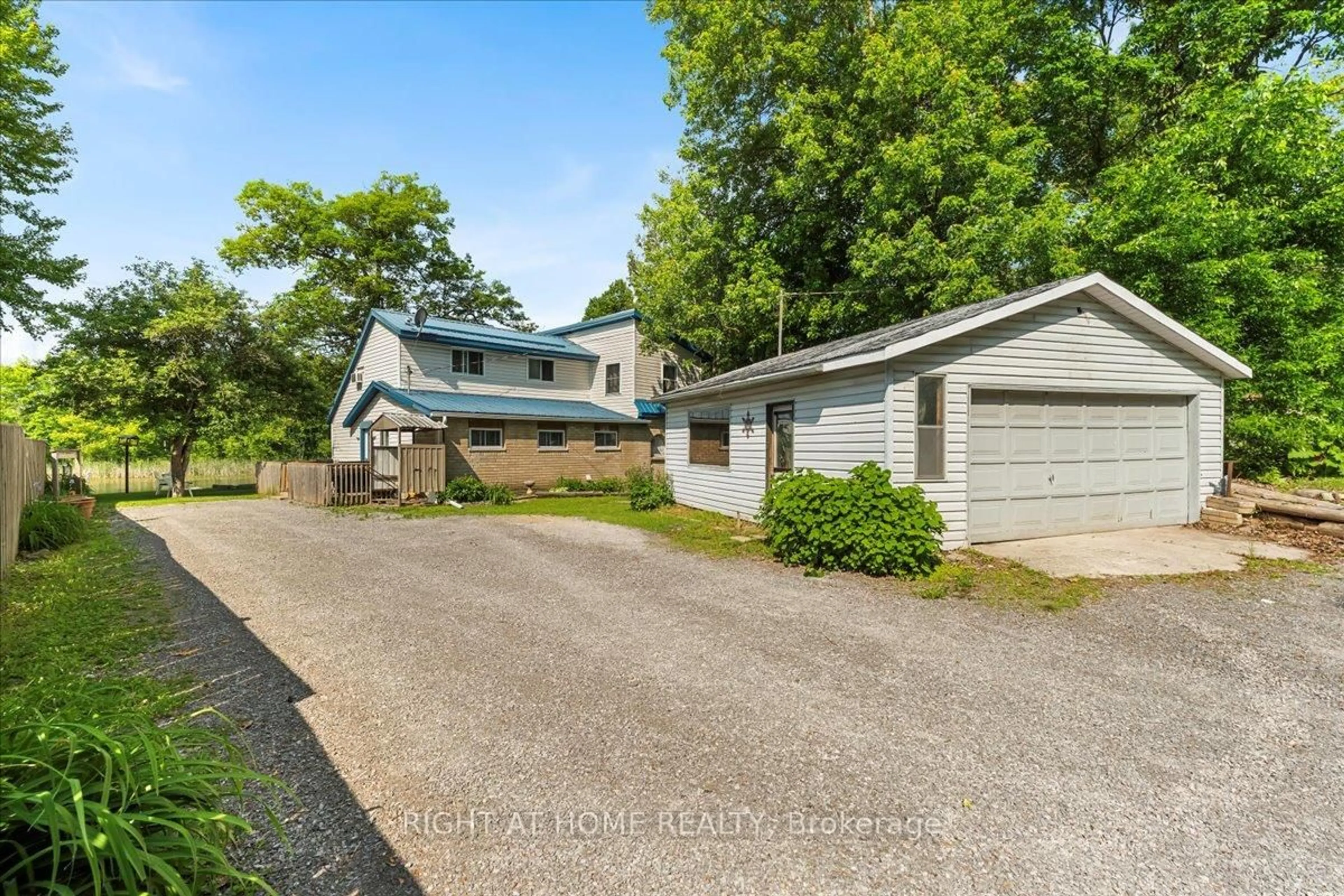 A pic from outside/outdoor area/front of a property/back of a property/a pic from drone, unknown for 205 River Rd, Trent Hills Ontario K0L 1L0