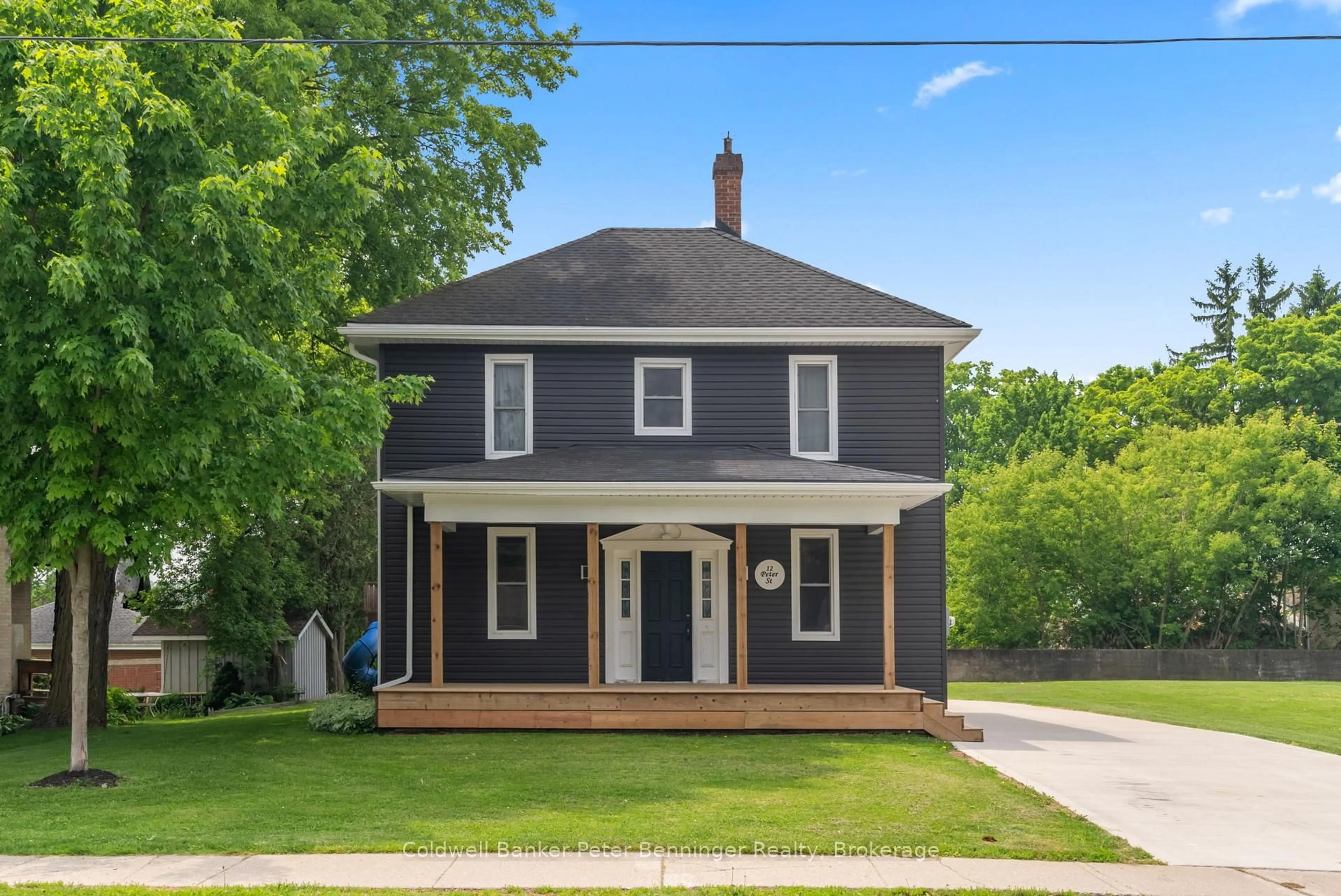 Home with vinyl exterior material, street for 12 Peter St, South Bruce Ontario N0G 2J0