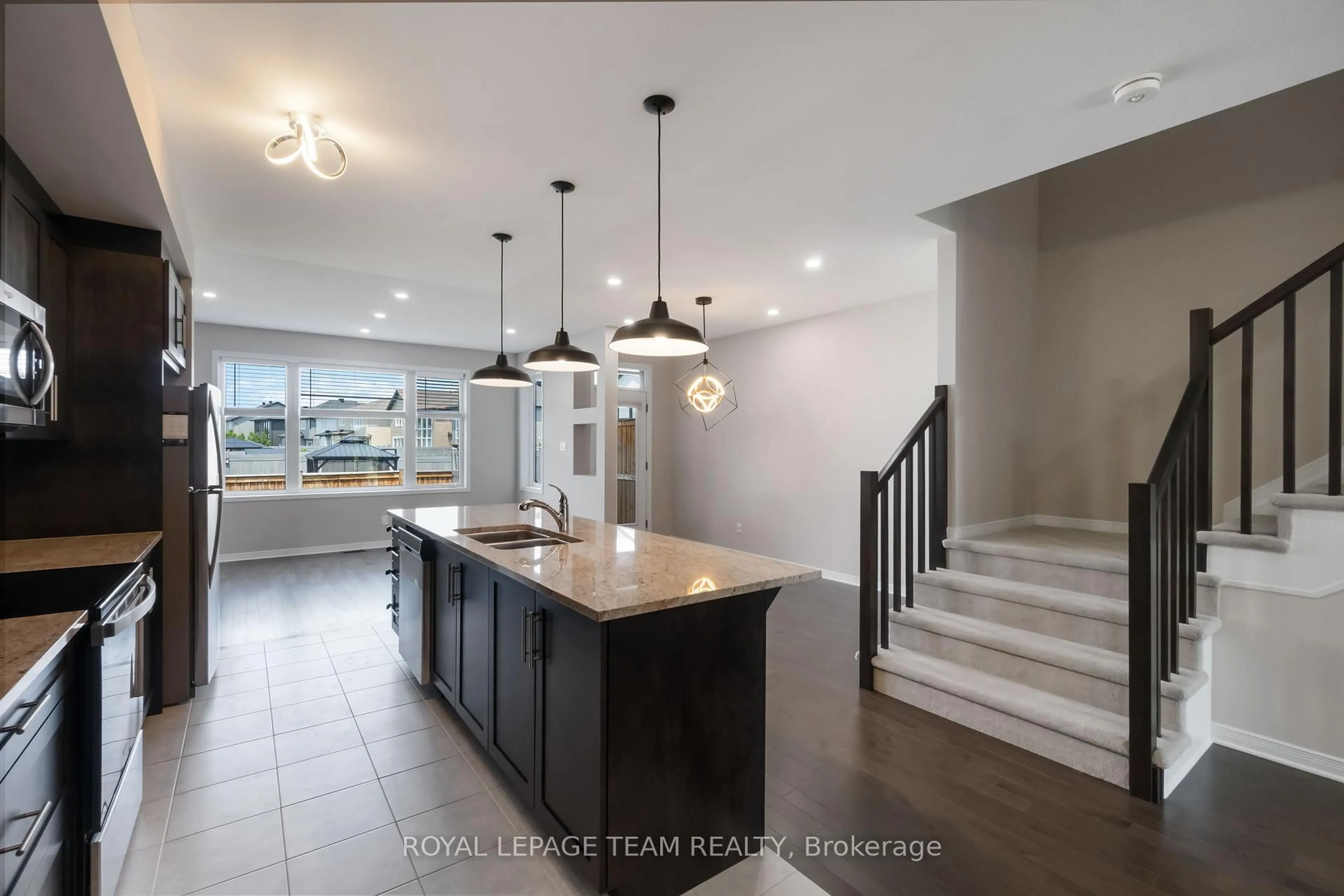 Open concept kitchen, ceramic/tile floor for 499 Cope Dr, Ottawa Ontario K2V 0P1