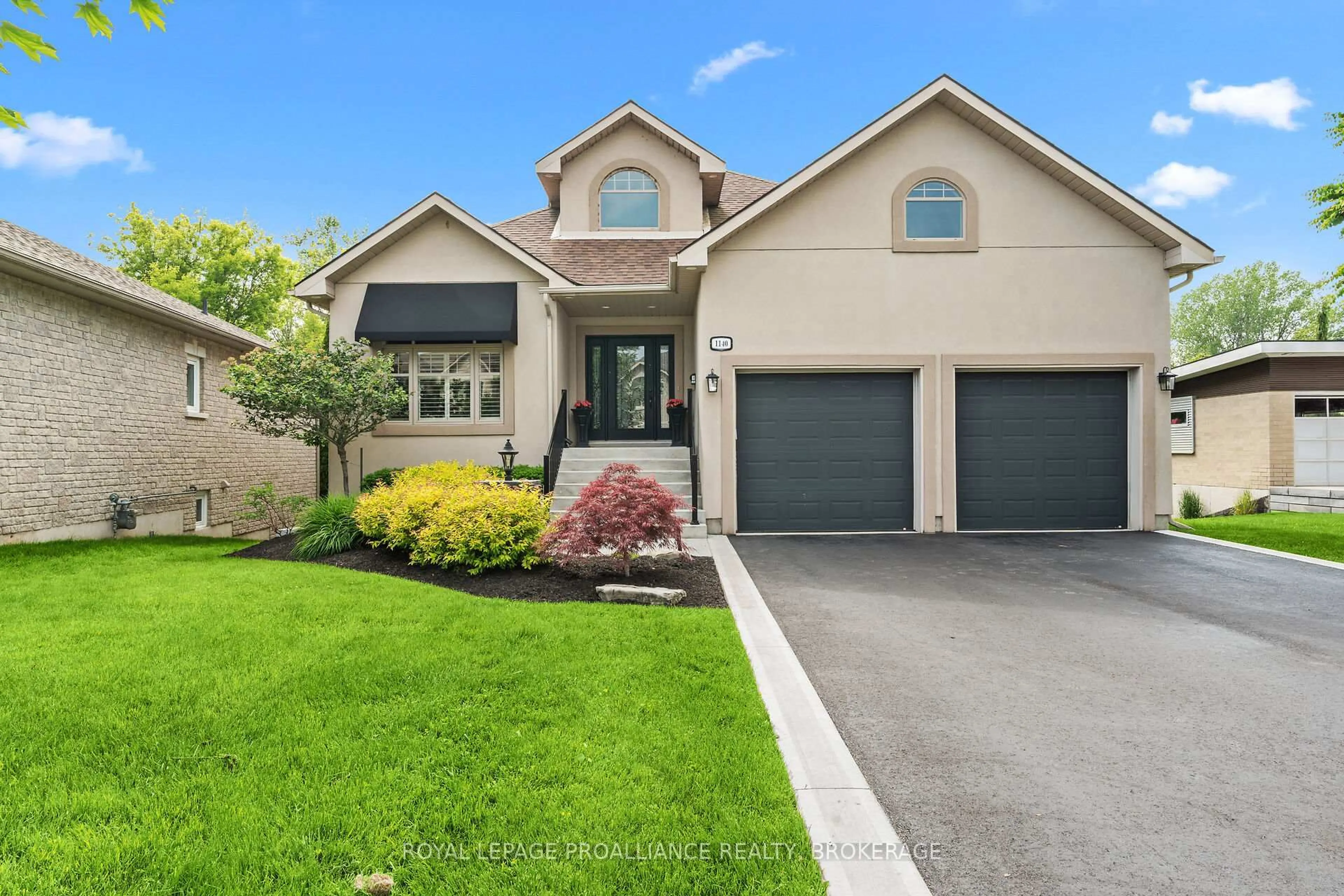 Home with vinyl exterior material, street for 1140 Trailhead Pl, Kingston Ontario K7M 9H3
