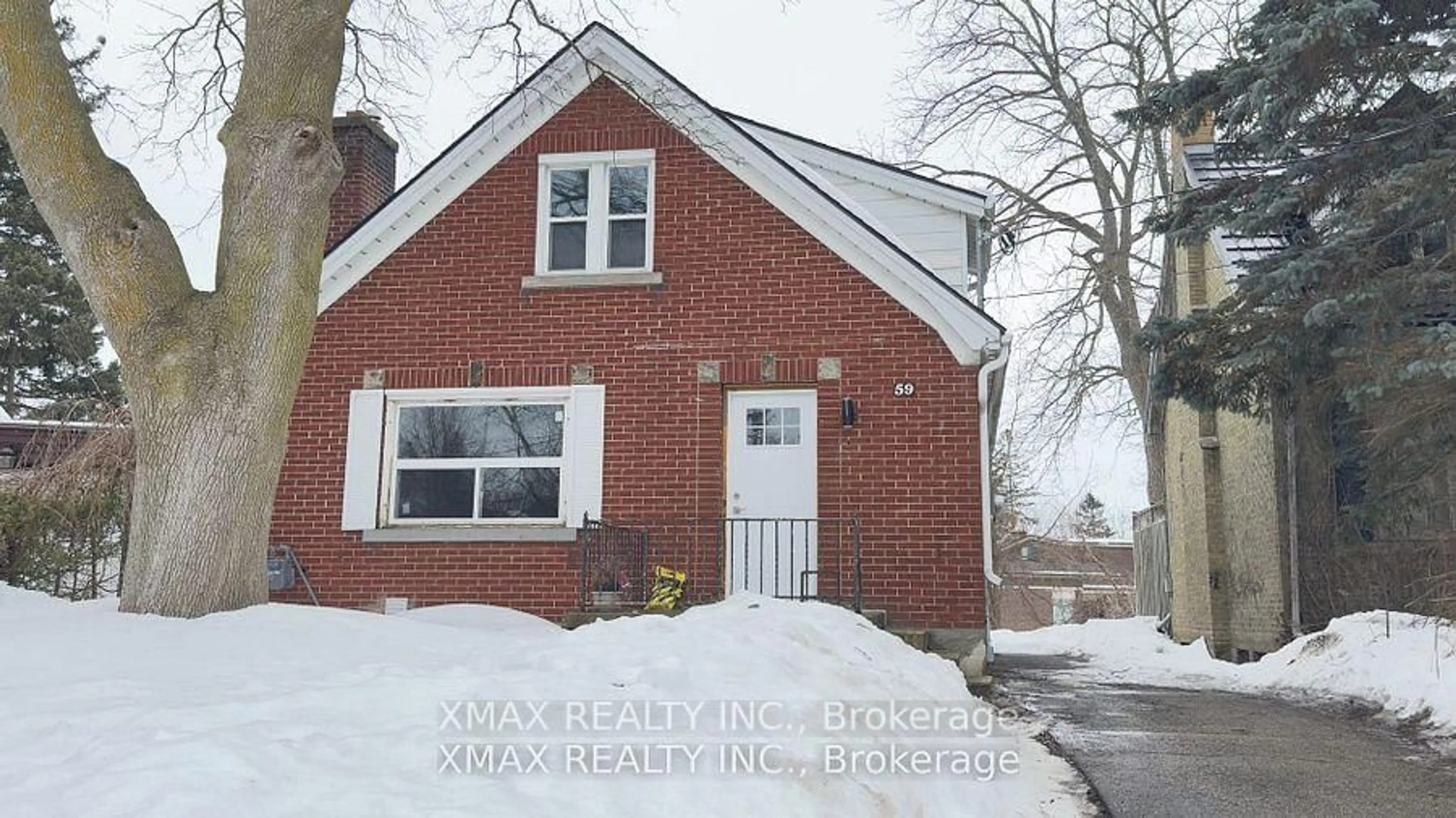 Home with brick exterior material, street for 59 Vancamp Ave, Kitchener Ontario N2M 1J1