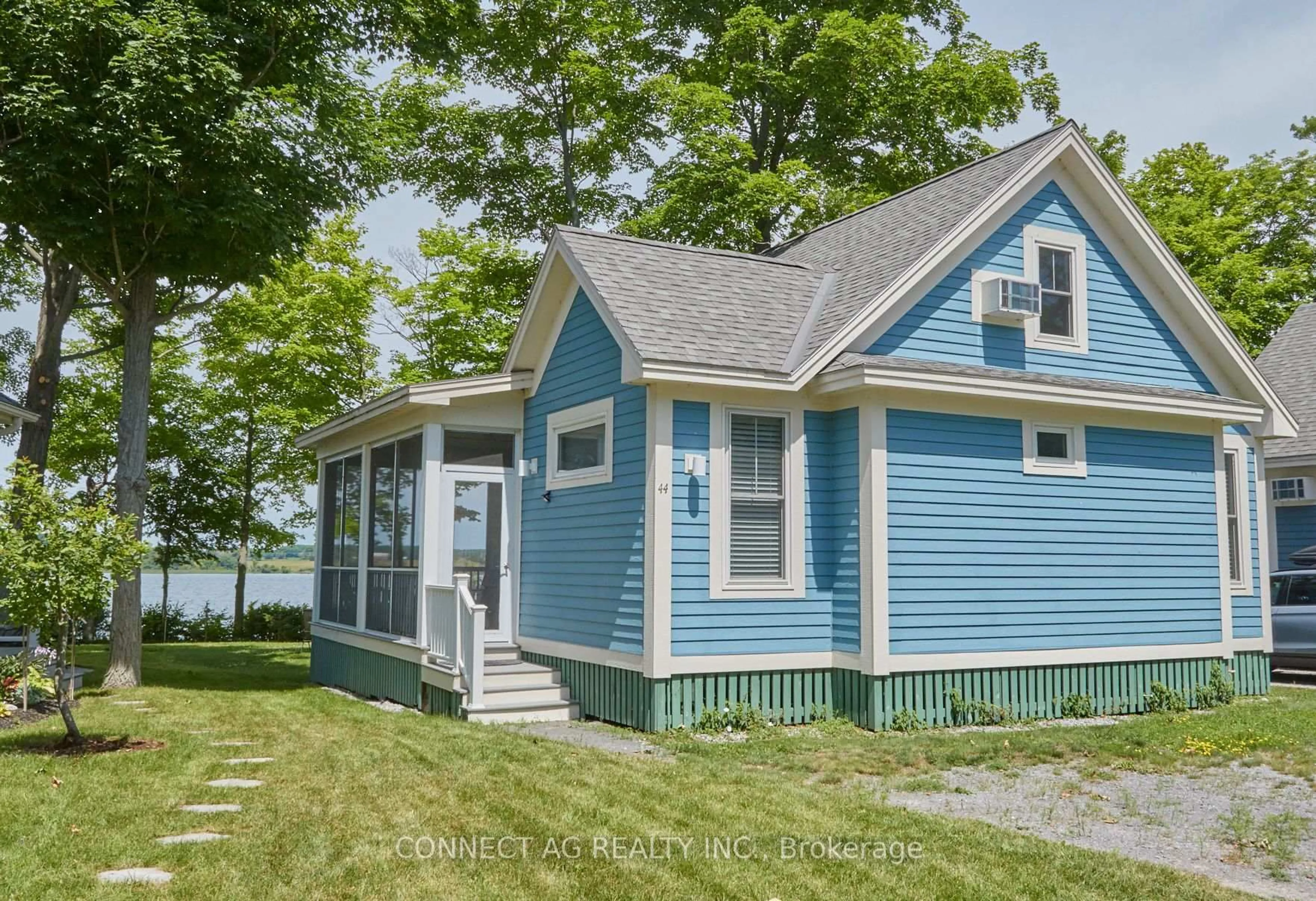 Home with vinyl exterior material, street for 44 Summer Village Lane #236, Prince Edward County Ontario K0K 1P0