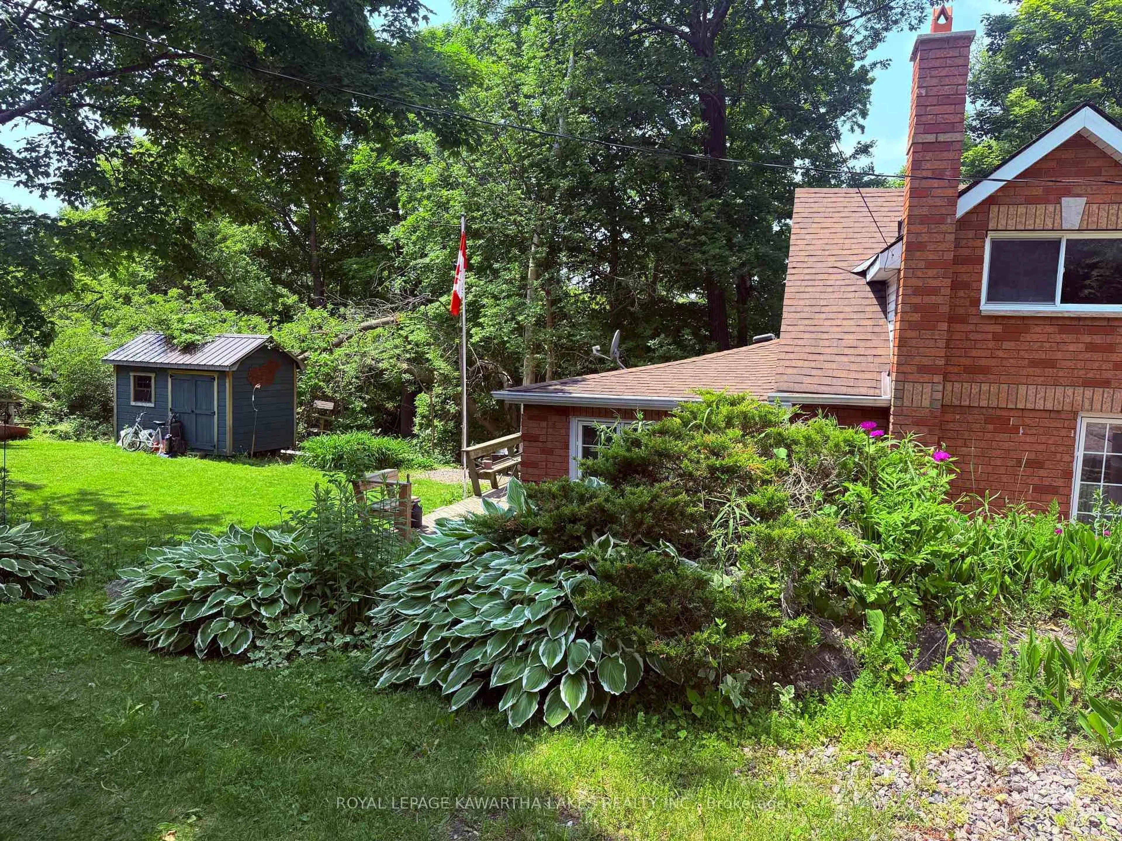 A pic from outside/outdoor area/front of a property/back of a property/a pic from drone, forest/trees view for 5 Government Dock Rd, Kawartha Lakes Ontario K0M 2L0