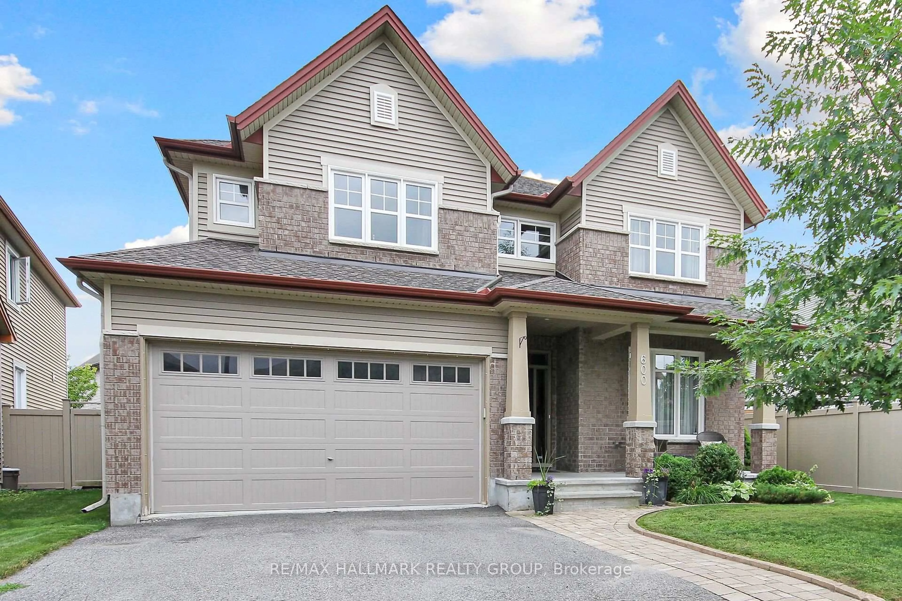 Home with brick exterior material, street for 600 Via Amalfi St, Ottawa Ontario K2J 5X8
