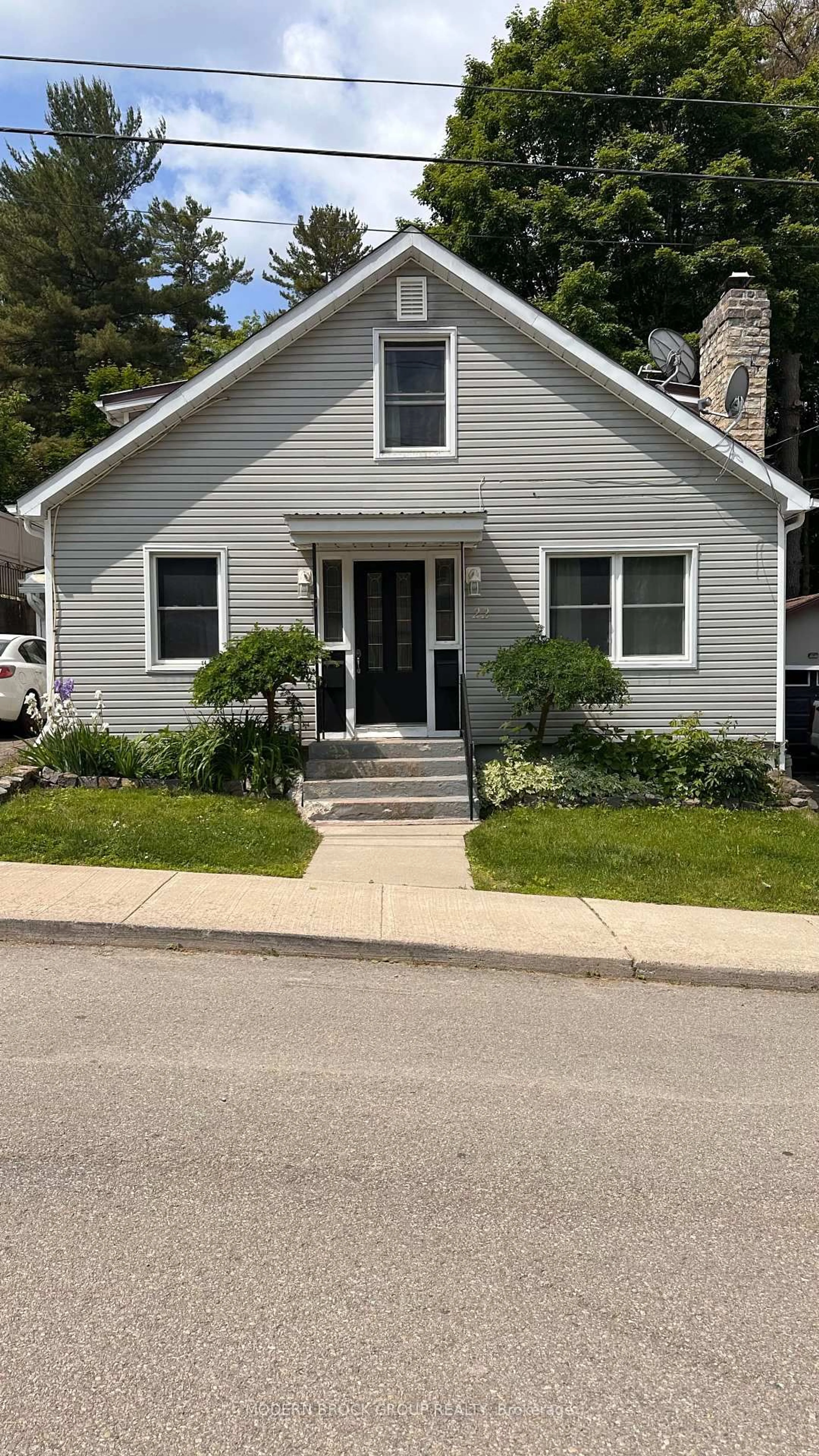 Home with vinyl exterior material, street for 22 Mccready St, Brockville Ontario K6V 5N3