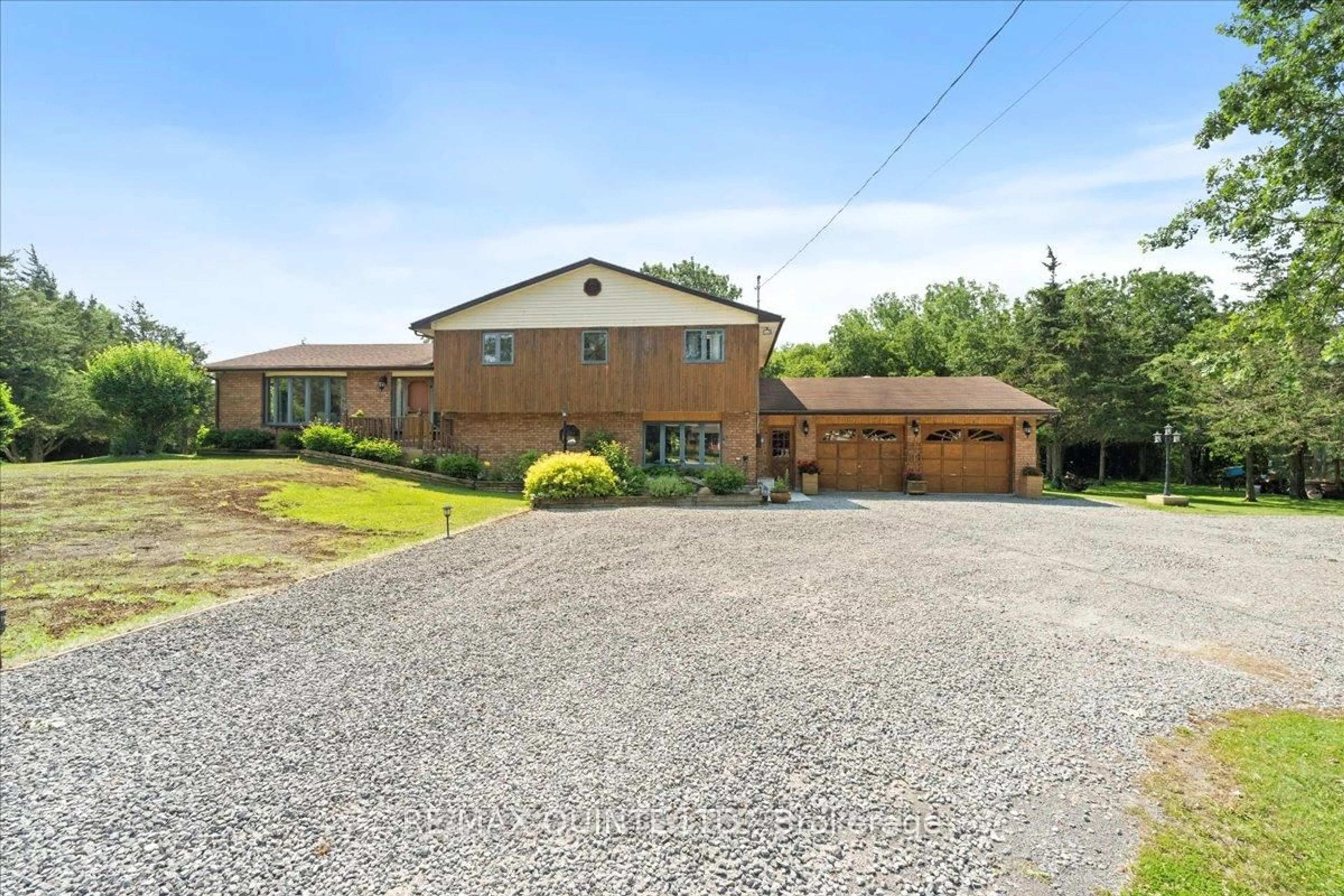 A pic from outside/outdoor area/front of a property/back of a property/a pic from drone, street for 338 Sunrise Dr, Prince Edward County Ontario K8N 4Z7