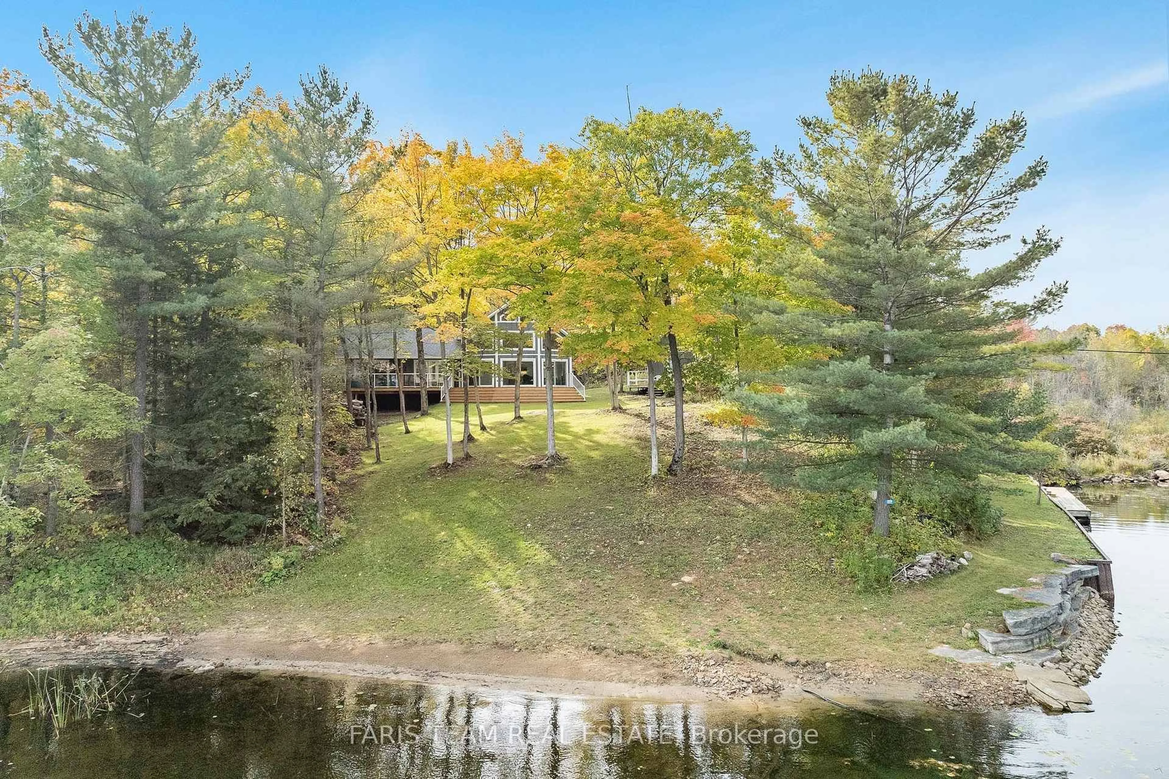 A pic from outside/outdoor area/front of a property/back of a property/a pic from drone, water/lake/river/ocean view for 9316 Georgian Bay Shore, Georgian Bay Ontario P0E 1E0