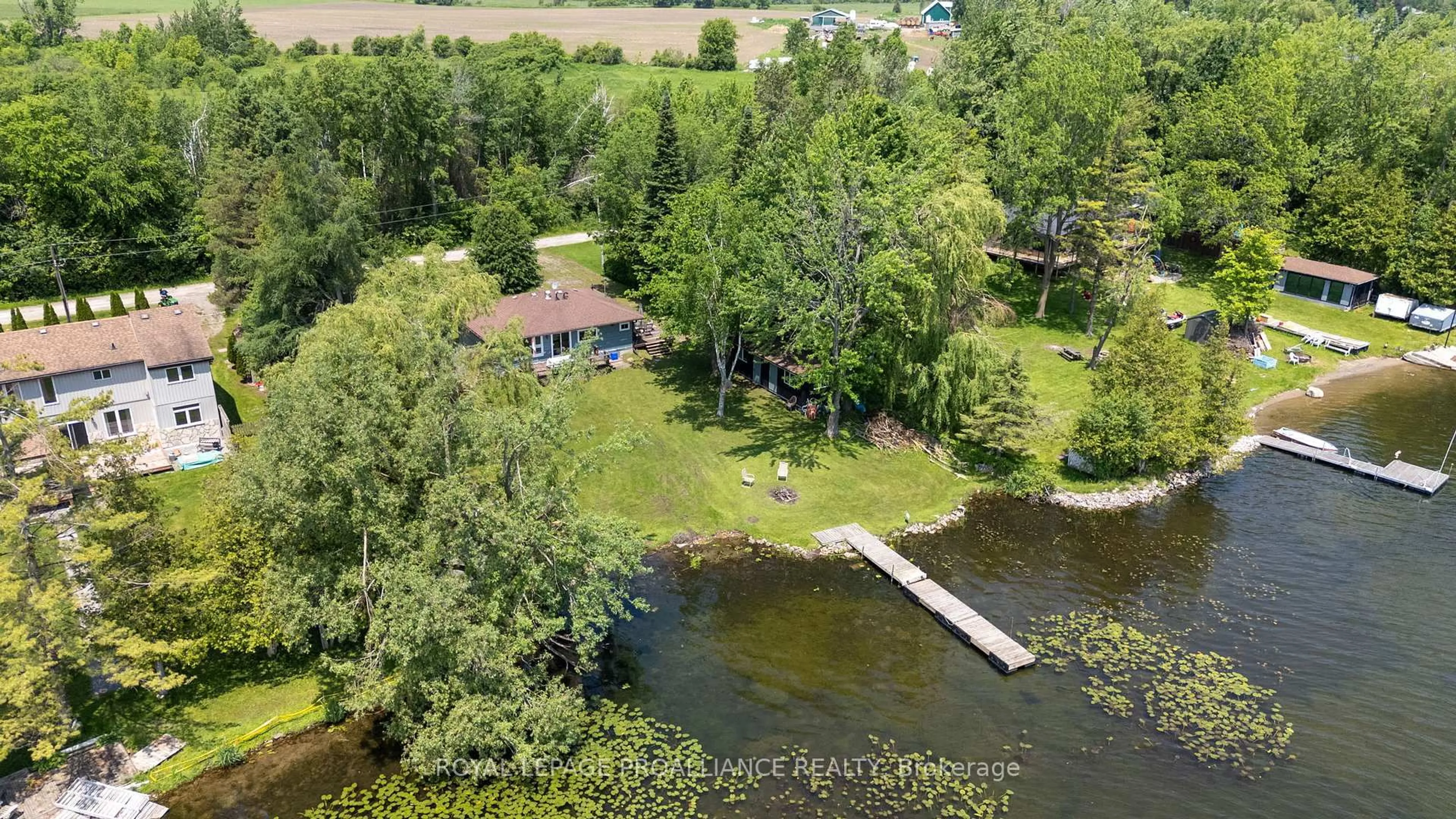 A pic from outside/outdoor area/front of a property/back of a property/a pic from drone, water/lake/river/ocean view for 70 Beach Rd, Kawartha Lakes Ontario K0M 2C0