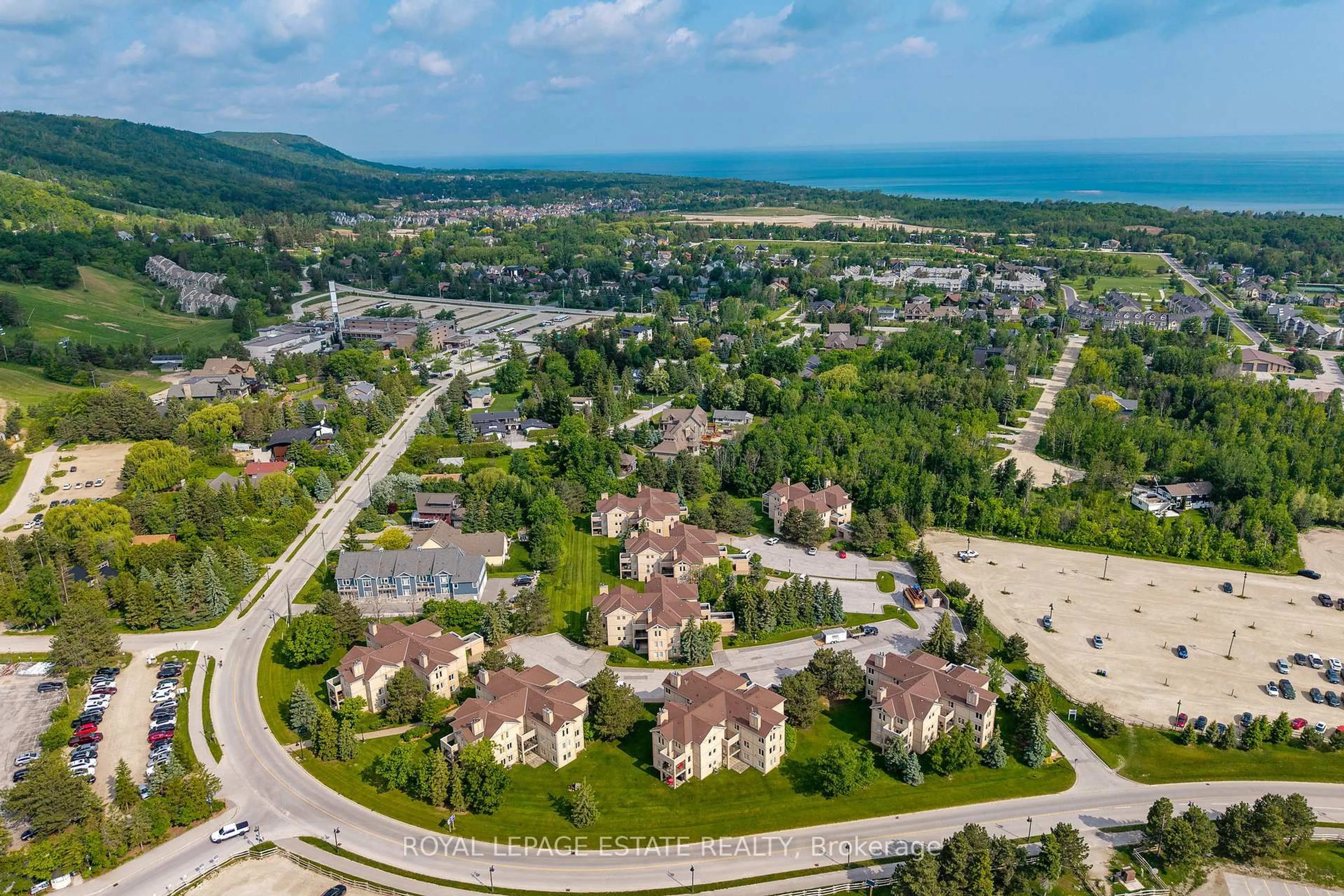 A pic from outside/outdoor area/front of a property/back of a property/a pic from drone, mountain view for 169 Jozo Weider Blvd #221, Blue Mountains Ontario L9Y 0P7