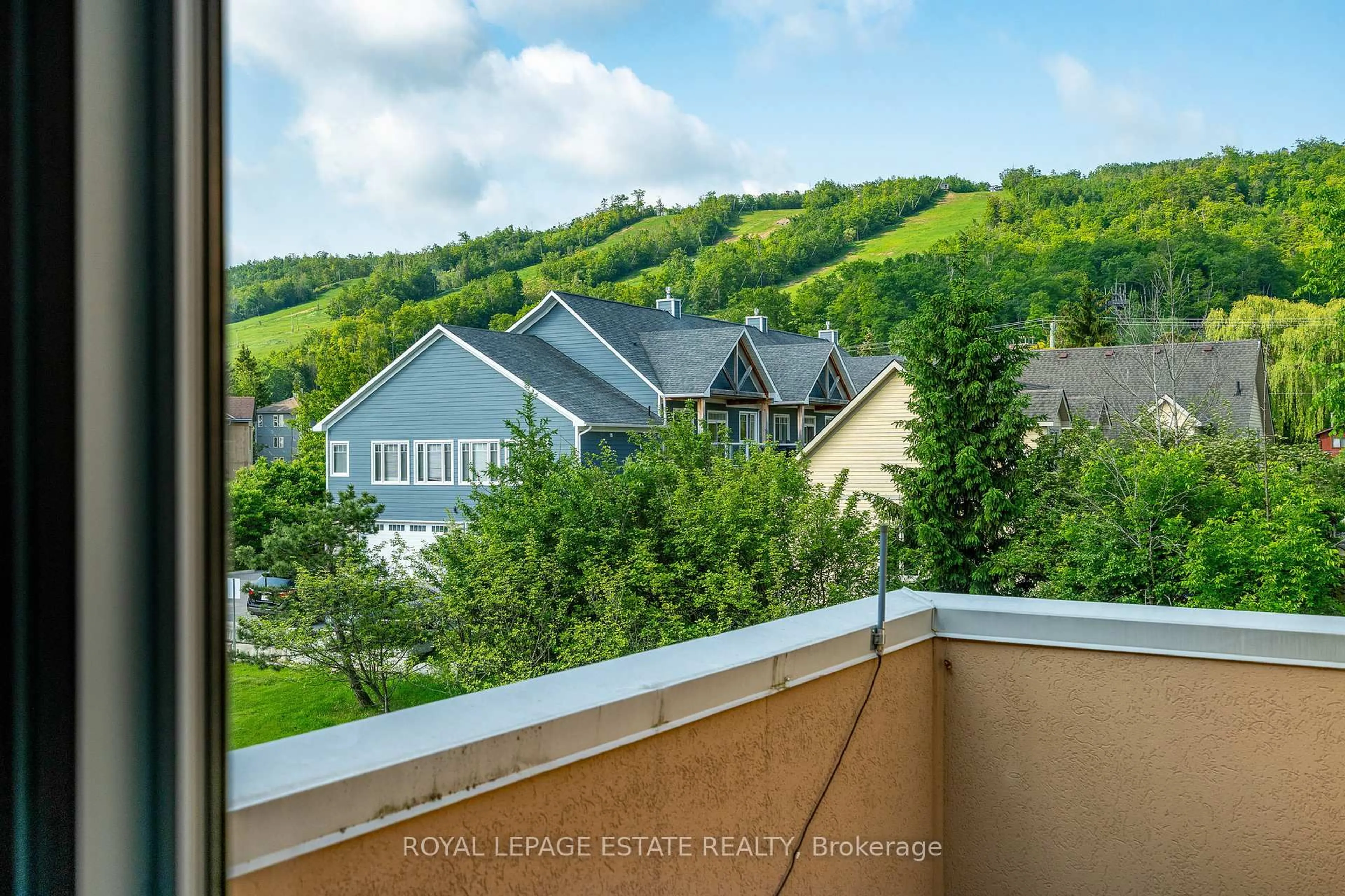 A pic from outside/outdoor area/front of a property/back of a property/a pic from drone, city buildings view from balcony for 169 Jozo Weider Blvd #221, Blue Mountains Ontario L9Y 0P7