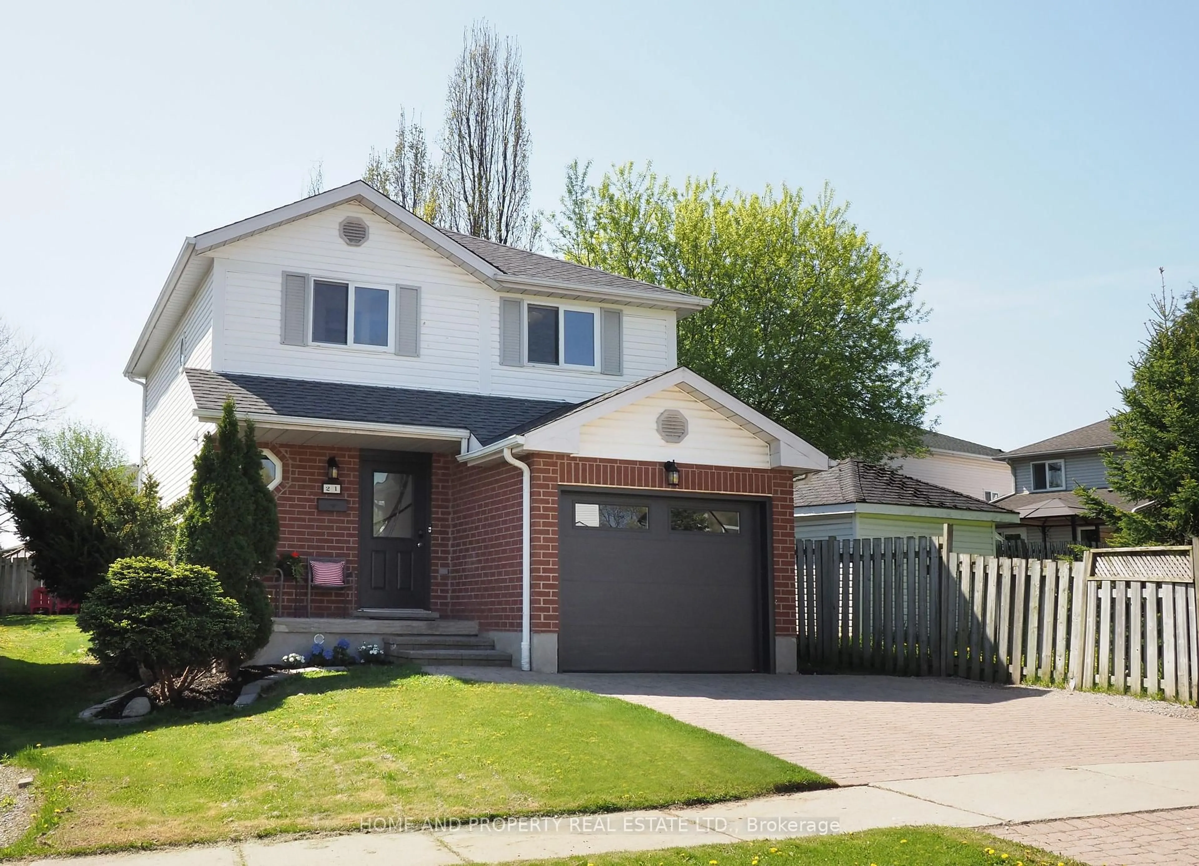 Home with brick exterior material, street for 21 Dawn Ridge Dr, Kitchener Ontario N2N 3J7