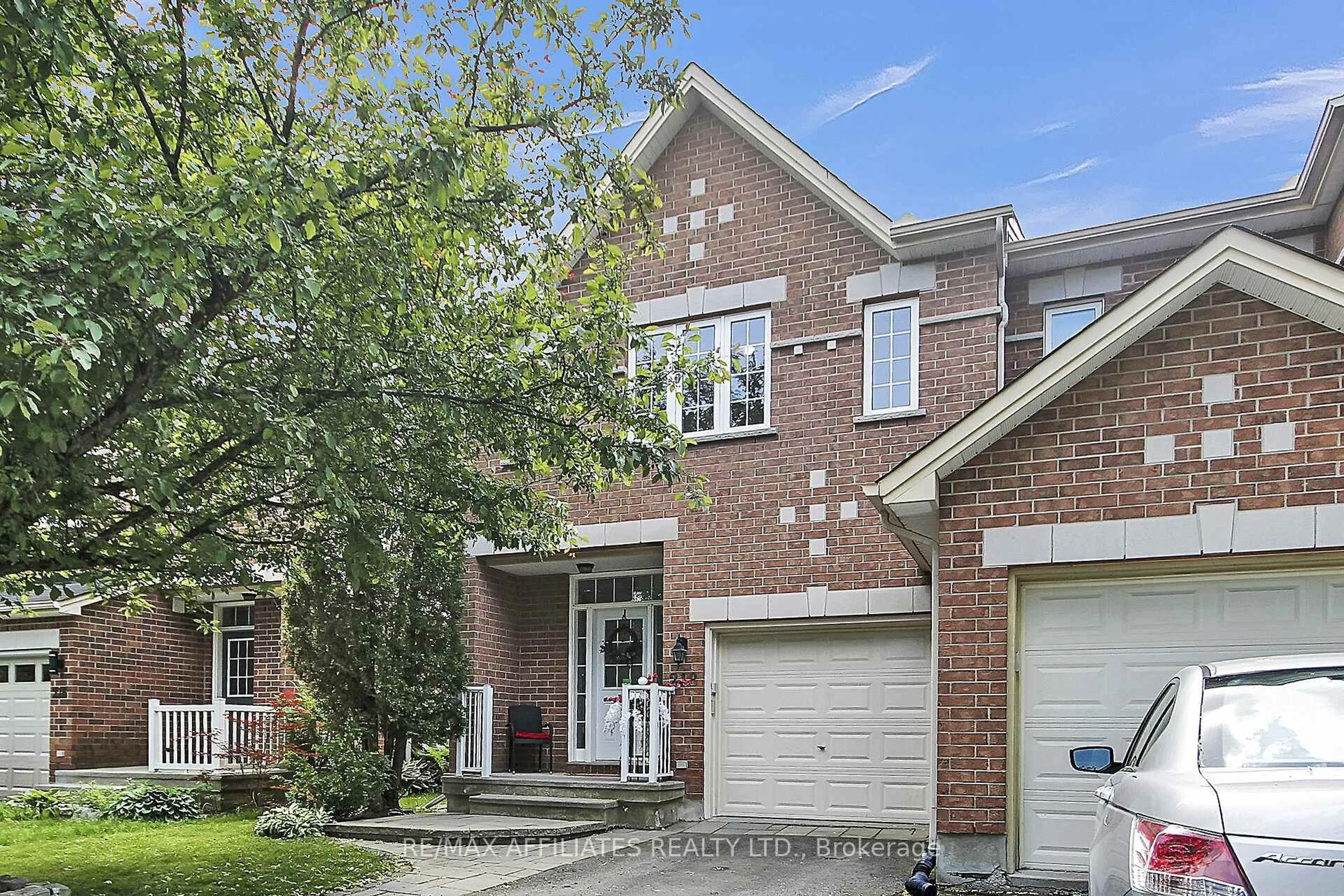 Home with brick exterior material, street for 218 BOOKTON Pl, Ottawa Ontario K1V 1L9