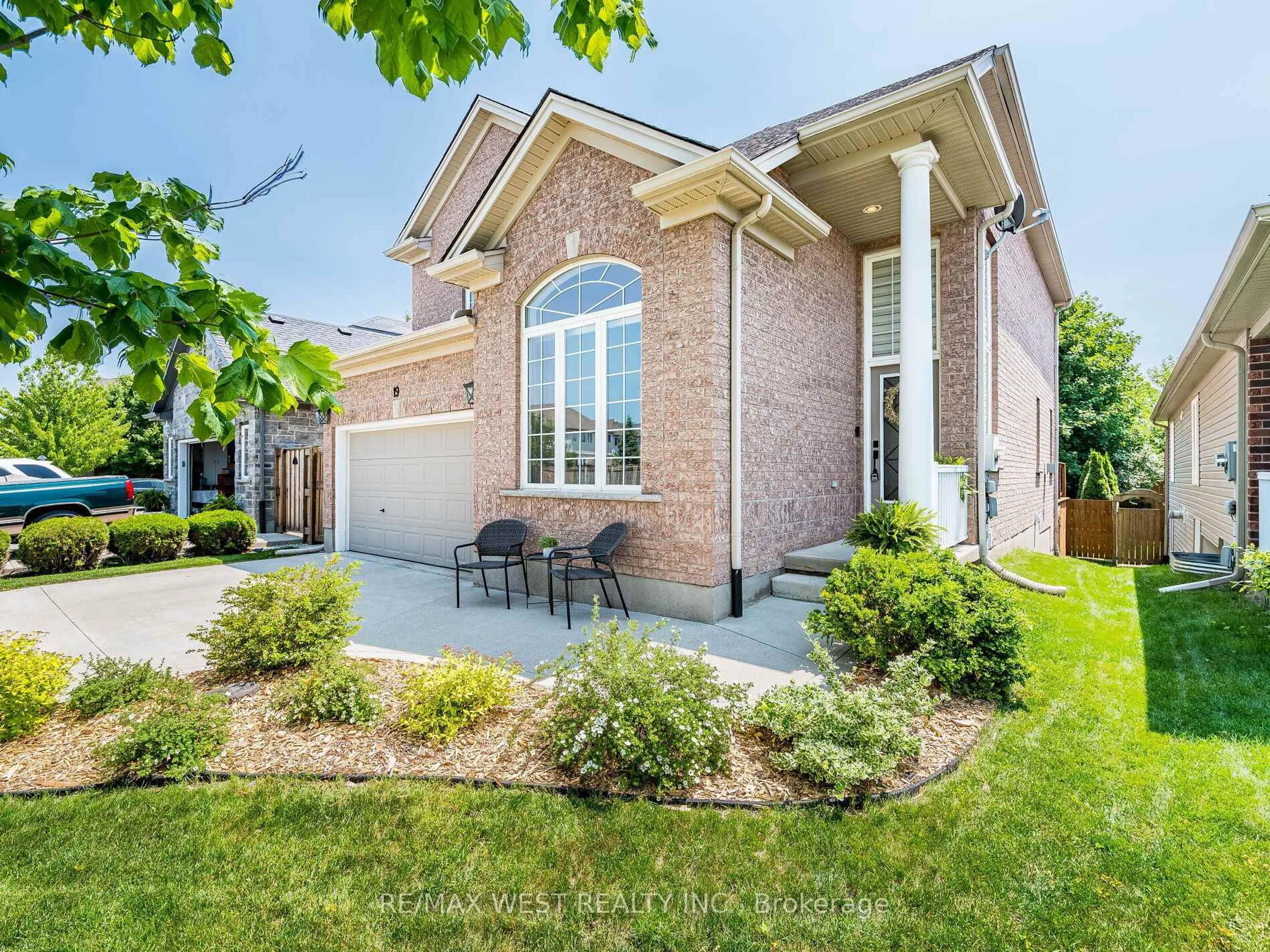Home with brick exterior material, street for 19 Bowen Dr, Guelph Ontario N1E 0C9
