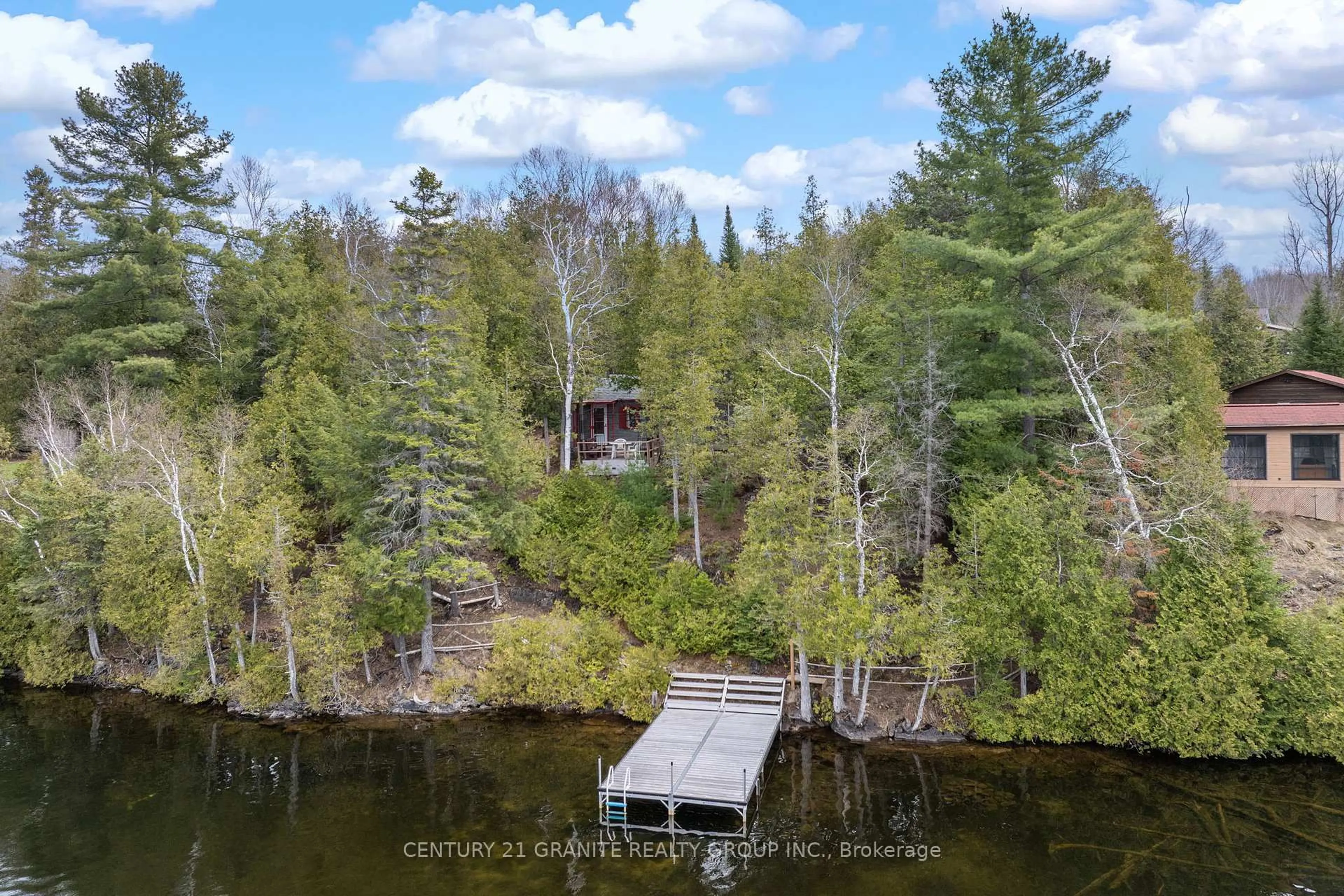 A pic from outside/outdoor area/front of a property/back of a property/a pic from drone, water/lake/river/ocean view for 1287 Upper Paudash Lake Rd, Highlands East Ontario K0L 1M0