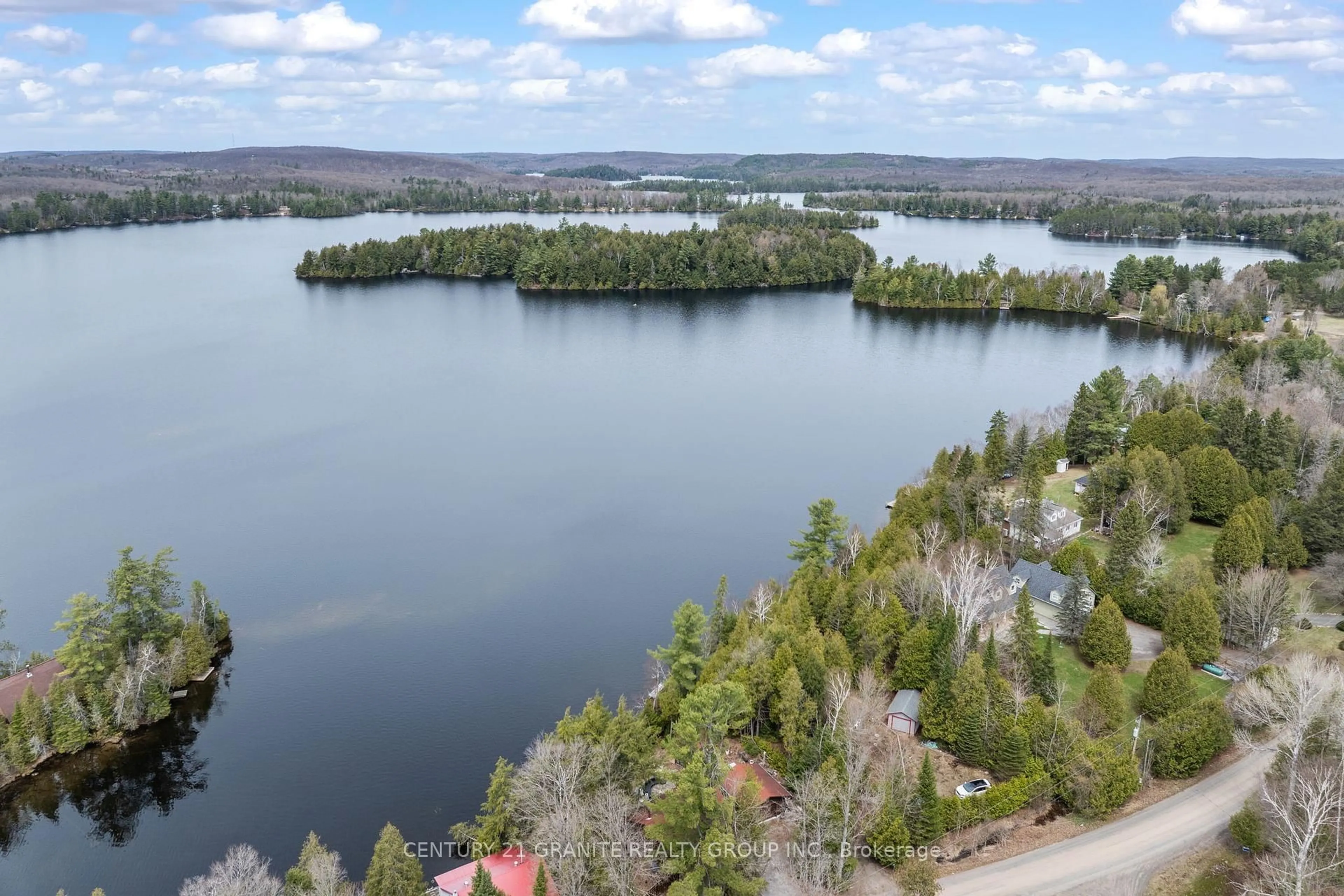 A pic from outside/outdoor area/front of a property/back of a property/a pic from drone, water/lake/river/ocean view for 1287 Upper Paudash Lake Rd, Highlands East Ontario K0L 1M0