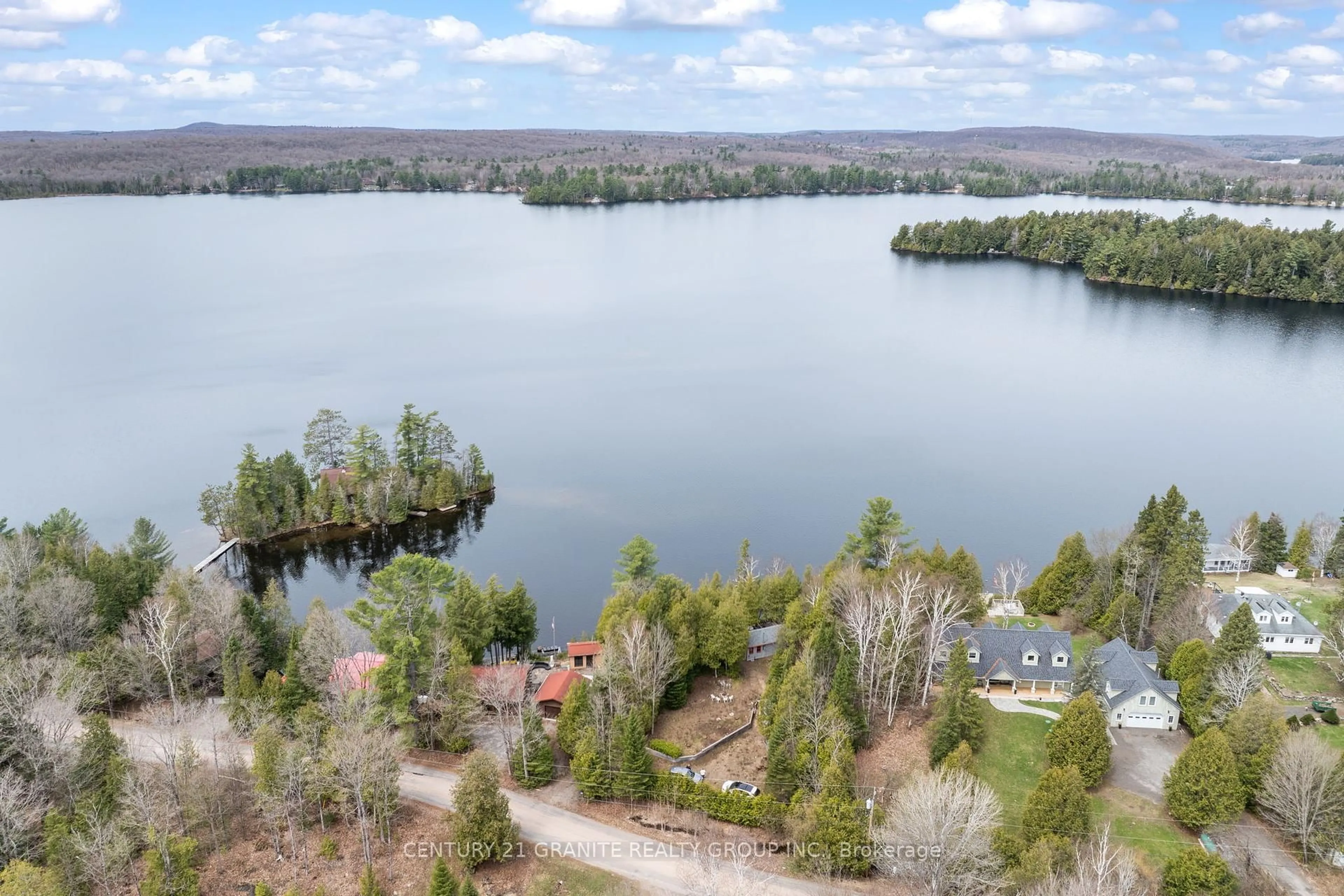 A pic from outside/outdoor area/front of a property/back of a property/a pic from drone, water/lake/river/ocean view for 1287 Upper Paudash Lake Rd, Highlands East Ontario K0L 1M0