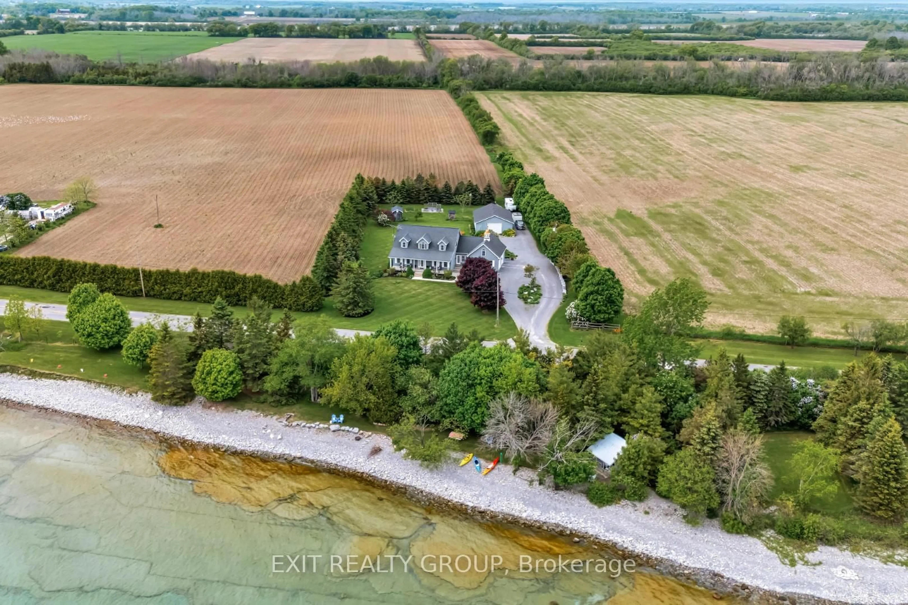 A pic from outside/outdoor area/front of a property/back of a property/a pic from drone, water/lake/river/ocean view for 830 Huycks Point Rd, Prince Edward County Ontario K0K 3L0