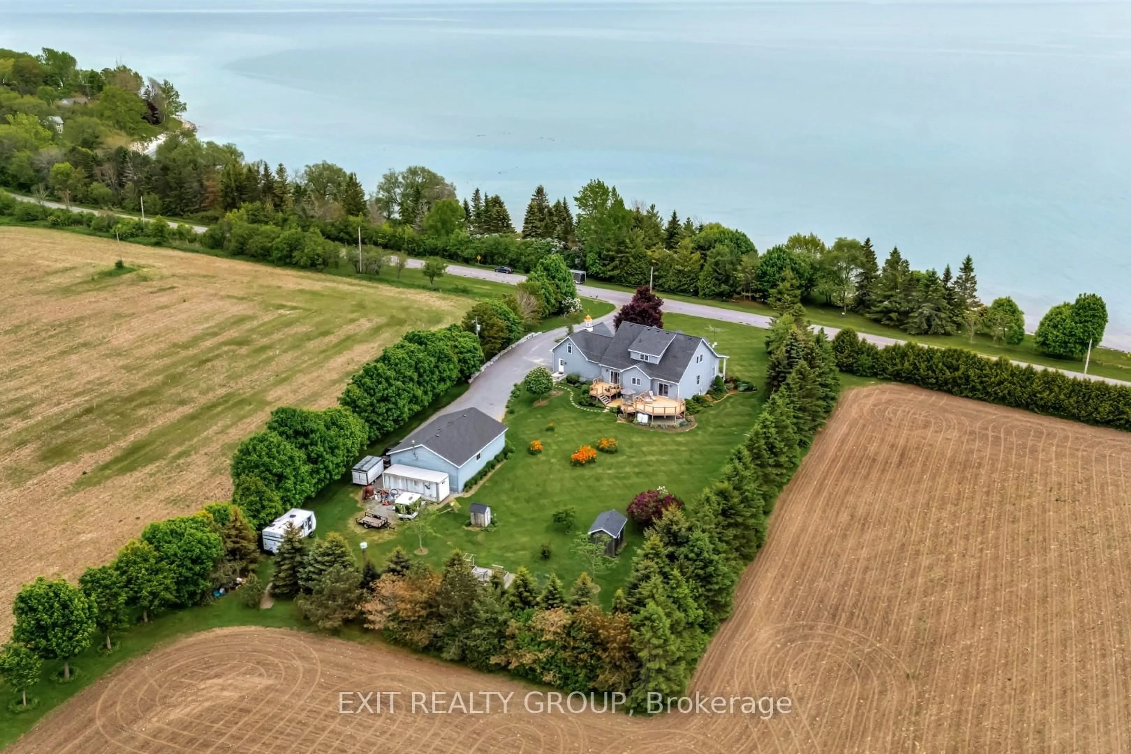 A pic from outside/outdoor area/front of a property/back of a property/a pic from drone, water/lake/river/ocean view for 830 Huycks Point Rd, Prince Edward County Ontario K0K 3L0