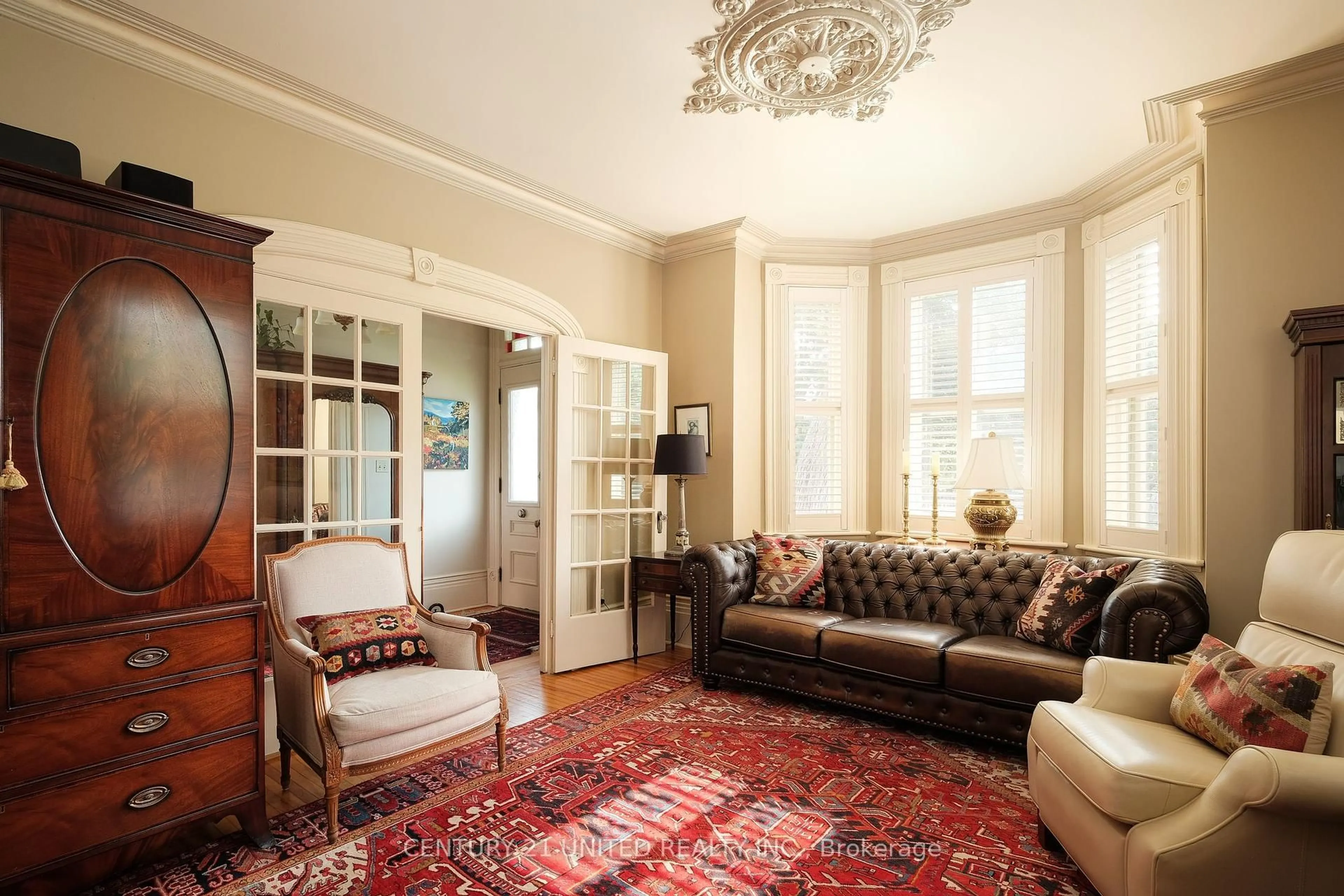 Living room with furniture, carpet floor for 558 Harvey St, Peterborough Central Ontario K9H 3K9