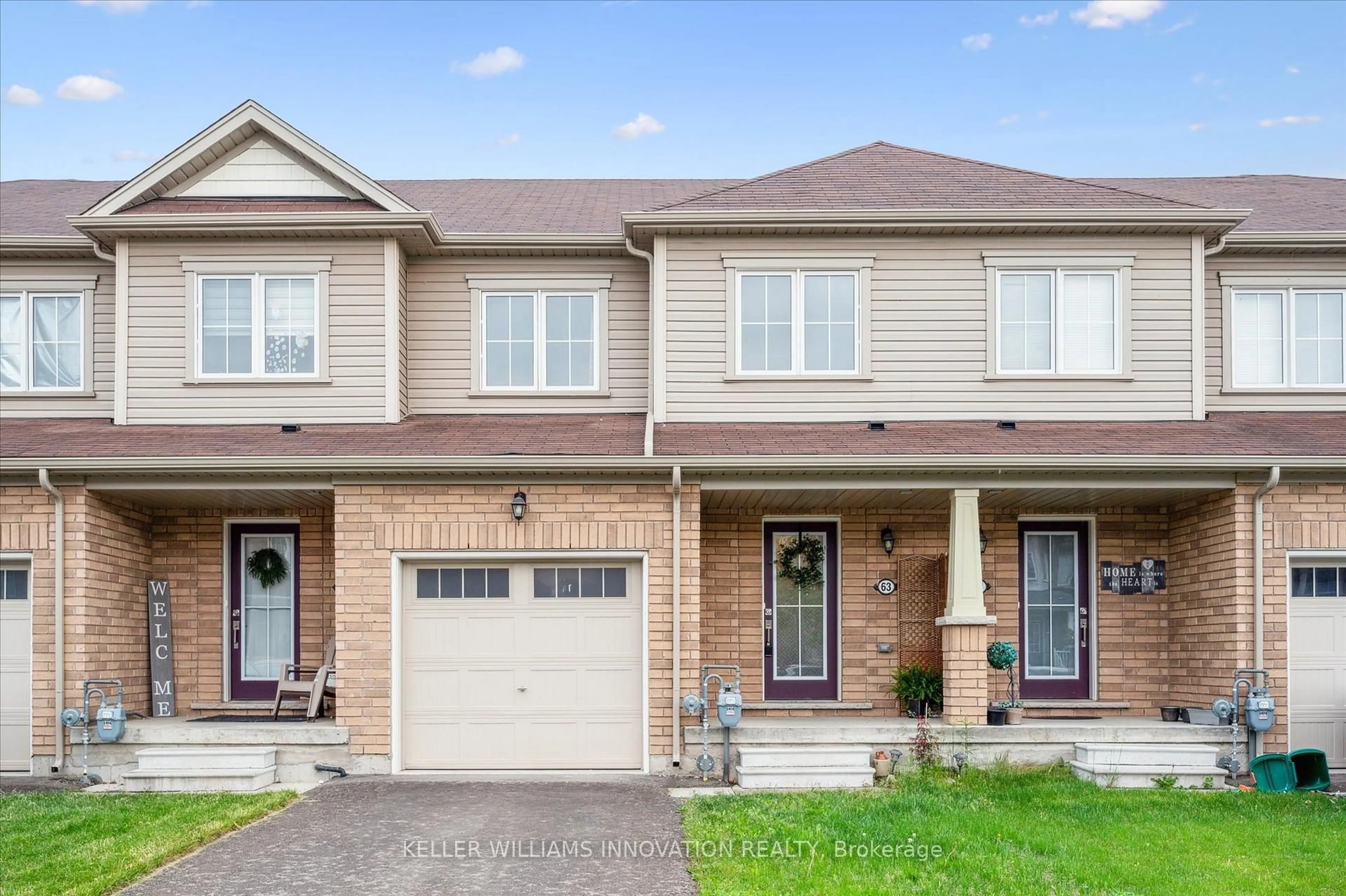 Home with brick exterior material, street for 63 Blacksmith Dr, Woolwich Ontario N0B 1M0