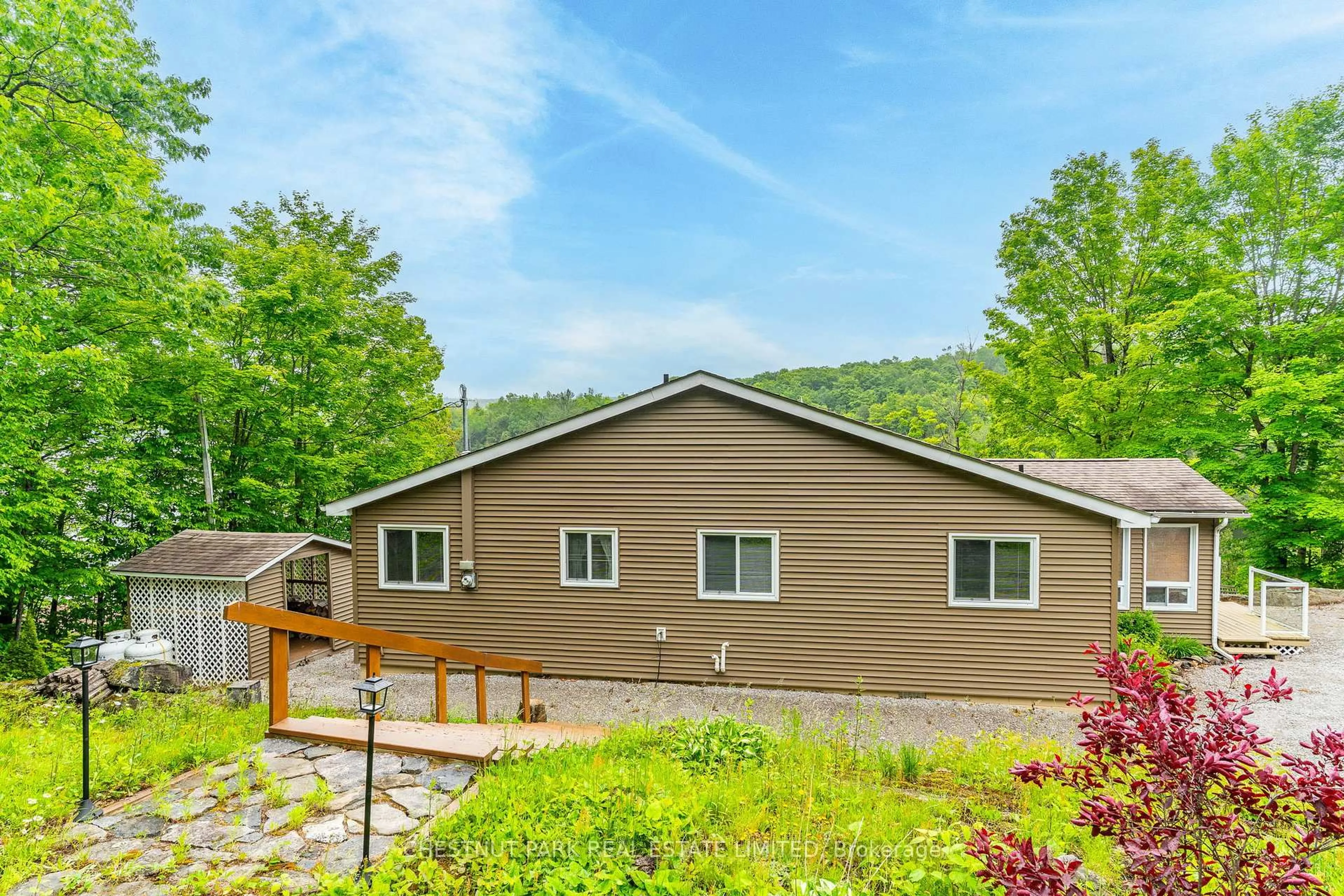 Home with vinyl exterior material, mountain view for 1601 Claude Brown Rd, Minden Hills Ontario K0M 2K0