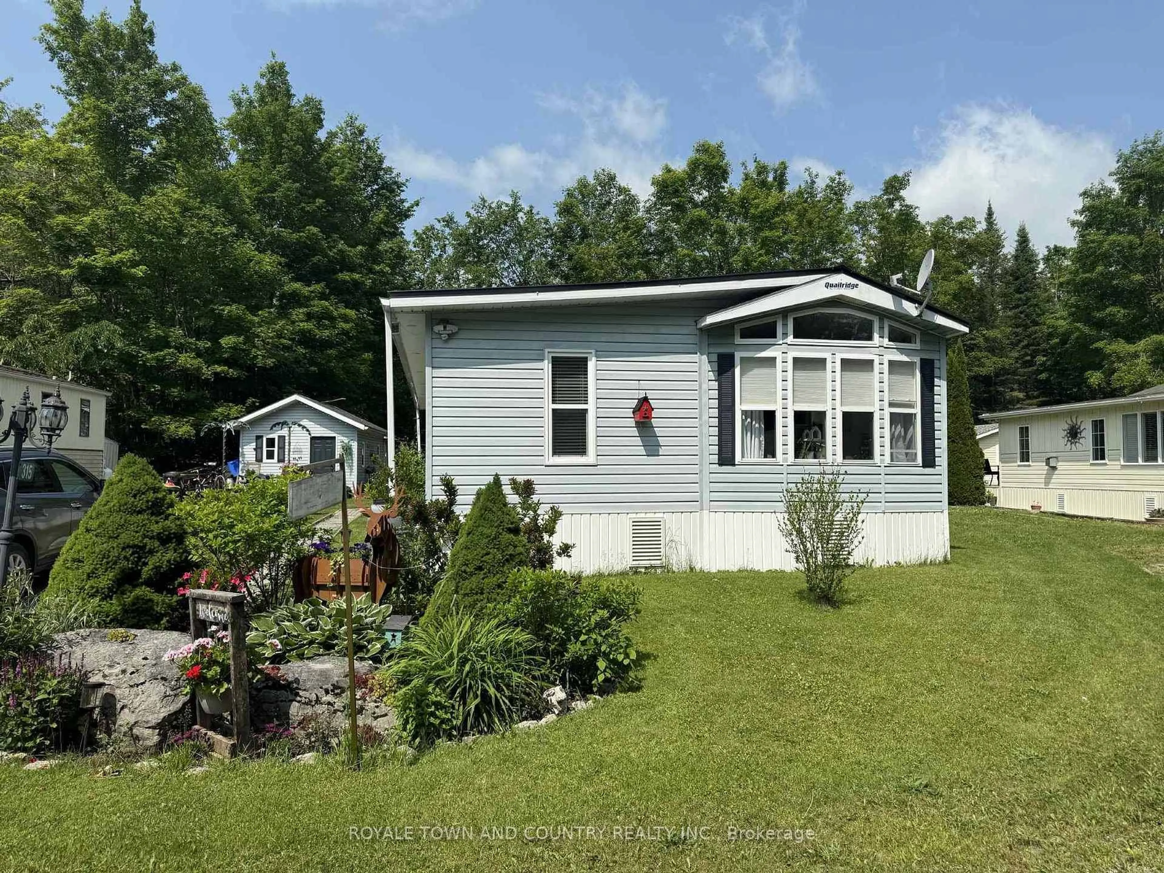 Home with vinyl exterior material, water/lake/river/ocean view for 1802 County Road 121 #315, Kawartha Lakes Ontario K0M 1N0
