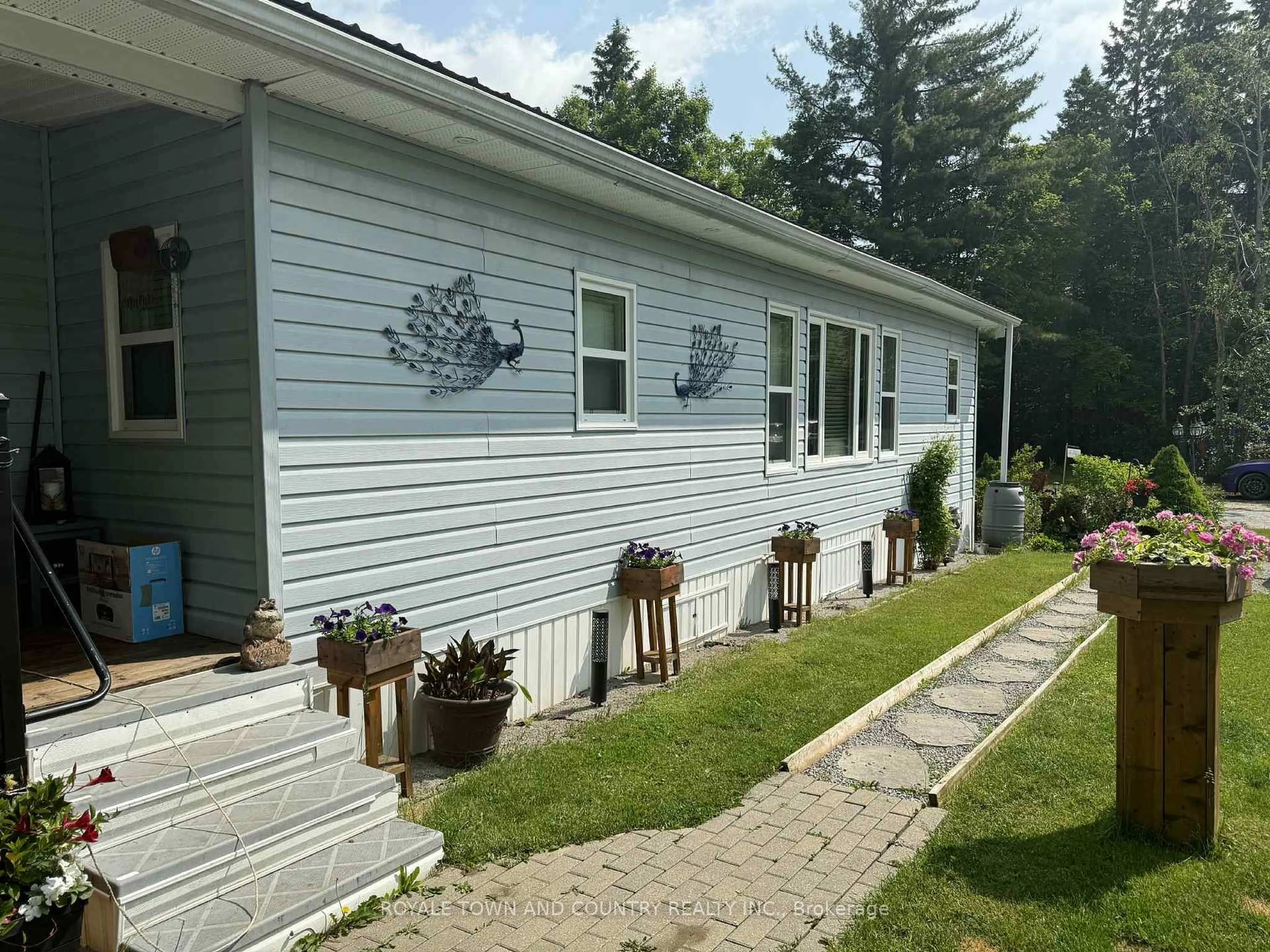 Home with vinyl exterior material, unknown for 1802 County Road 121 #315, Kawartha Lakes Ontario K0M 1N0