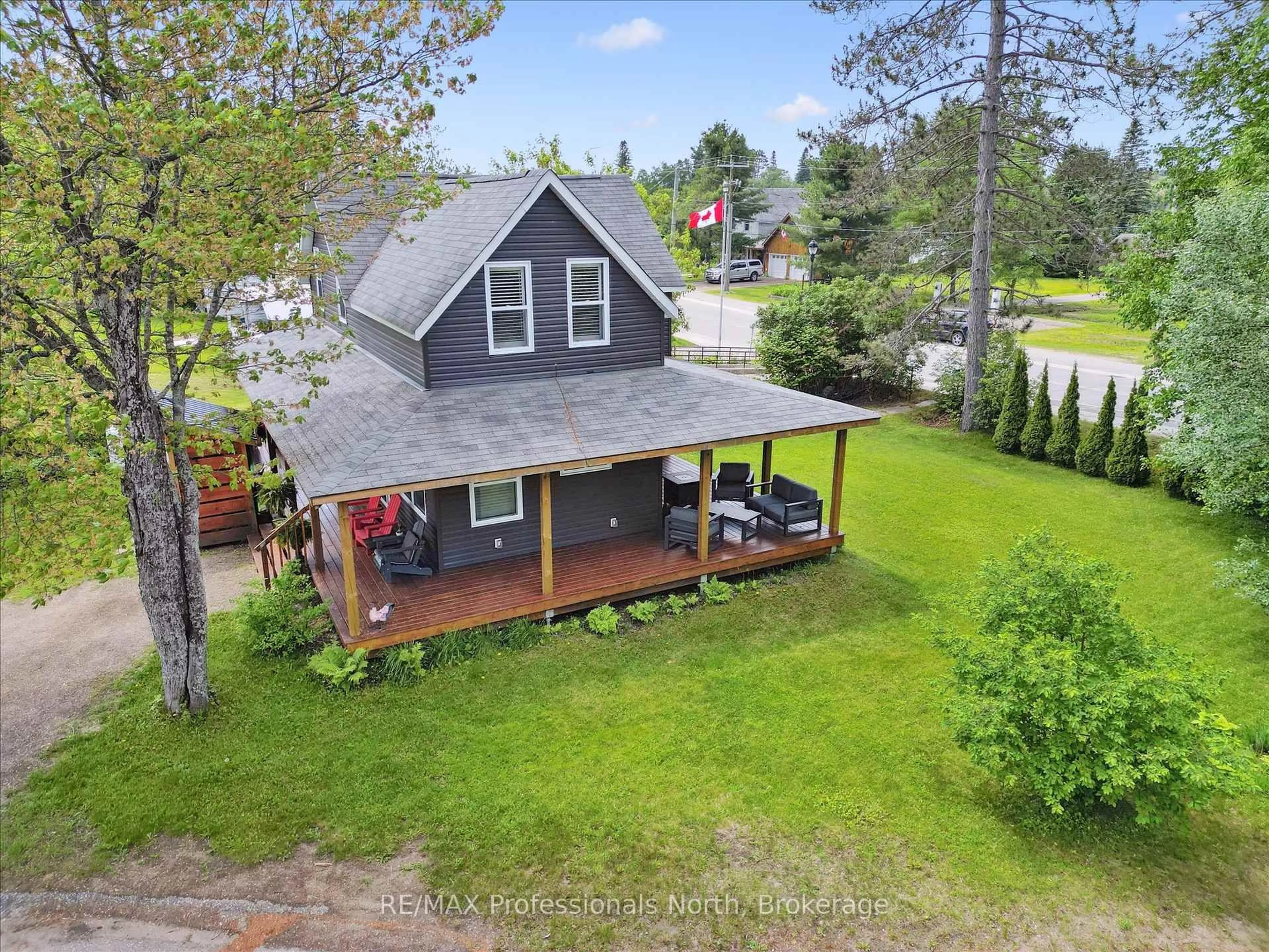 A pic from outside/outdoor area/front of a property/back of a property/a pic from drone, unknown for 54 Main St, Kearney Ontario P0A 1M0