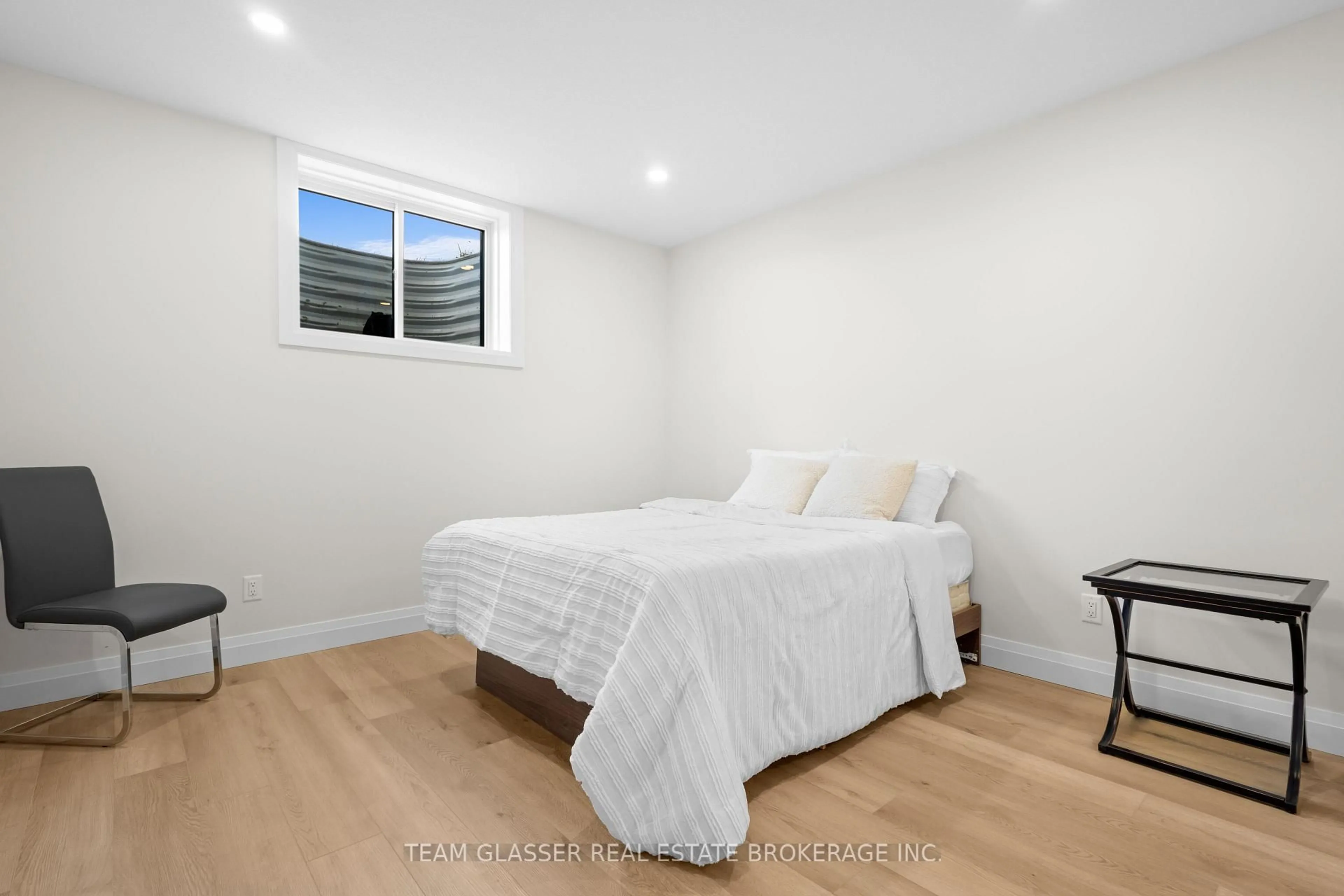 Bedroom with bed, wood/laminate floor for 79 Allister Dr, Middlesex Centre Ontario N0L 1R0
